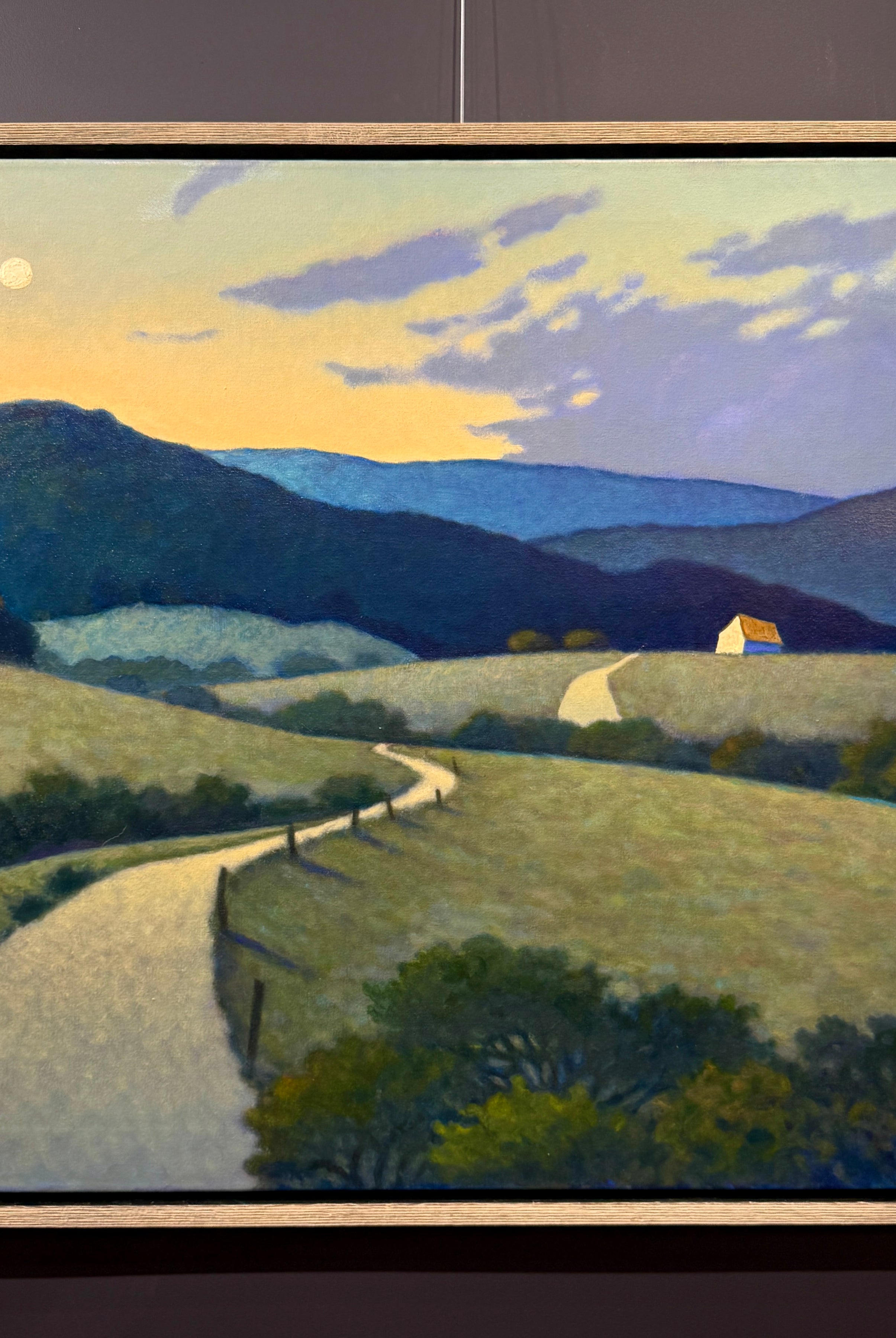 Original oil on canvas painting by North Carolina painter Janet Green Jacobson featuring rolling hills barn mountains and meandering country road