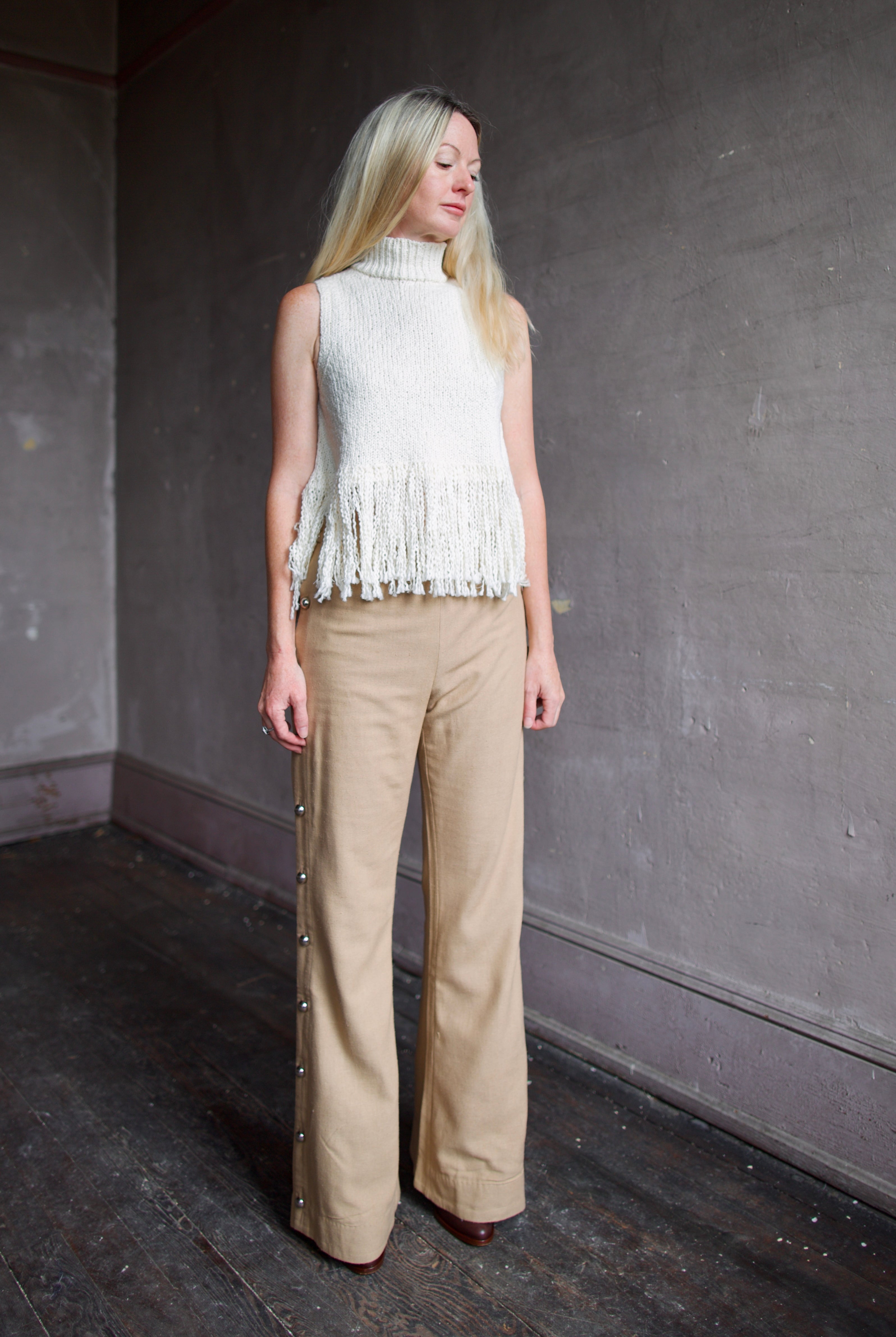 woman wearing beige 100% raw silk Alix of Bohemia tailored trouser no pockets clean back and front straight leg
