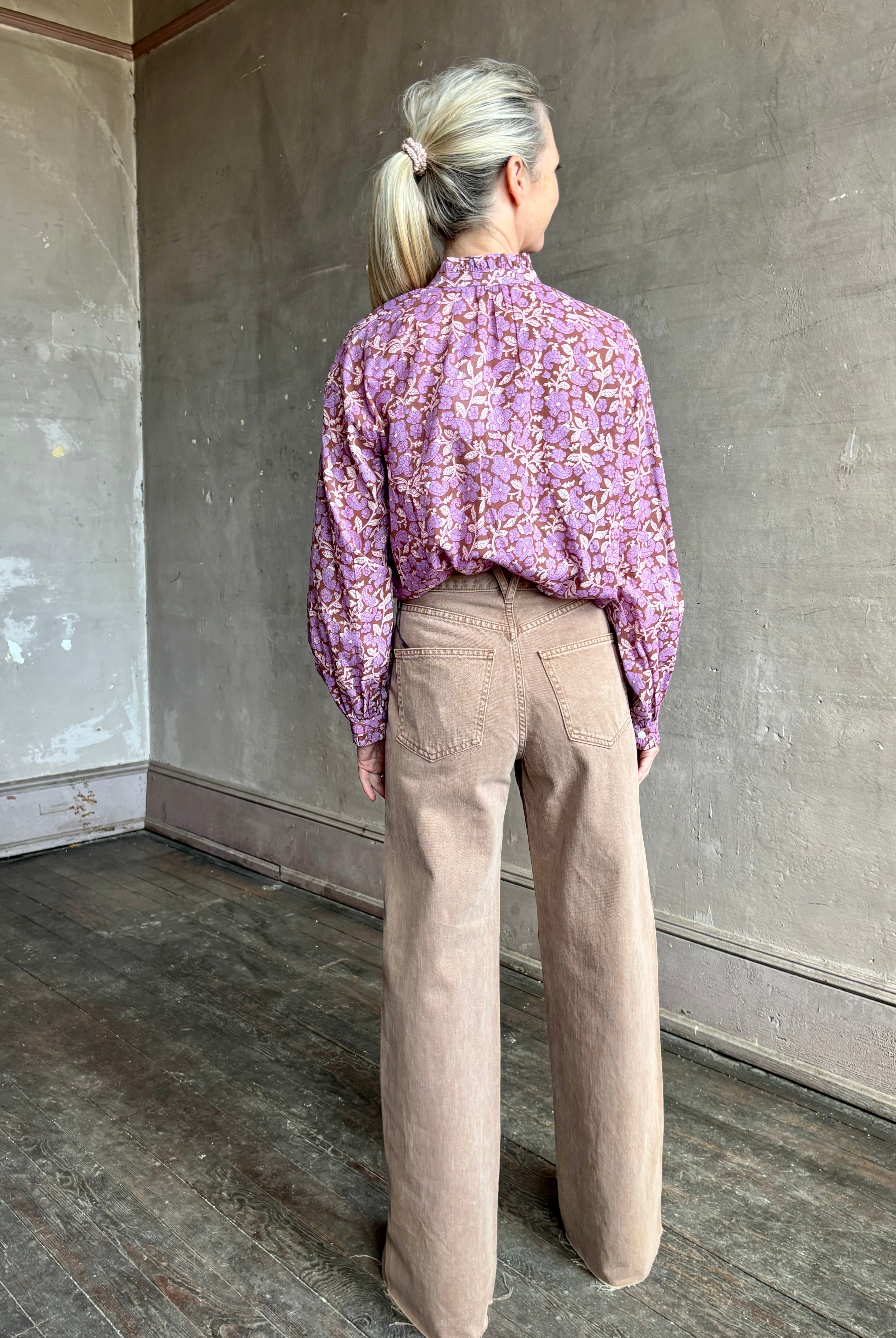Image of woman wearing Alix of Bohemia Poet Twilight floral blouse with mandarin collar long sleeves and delicate ruffle accents