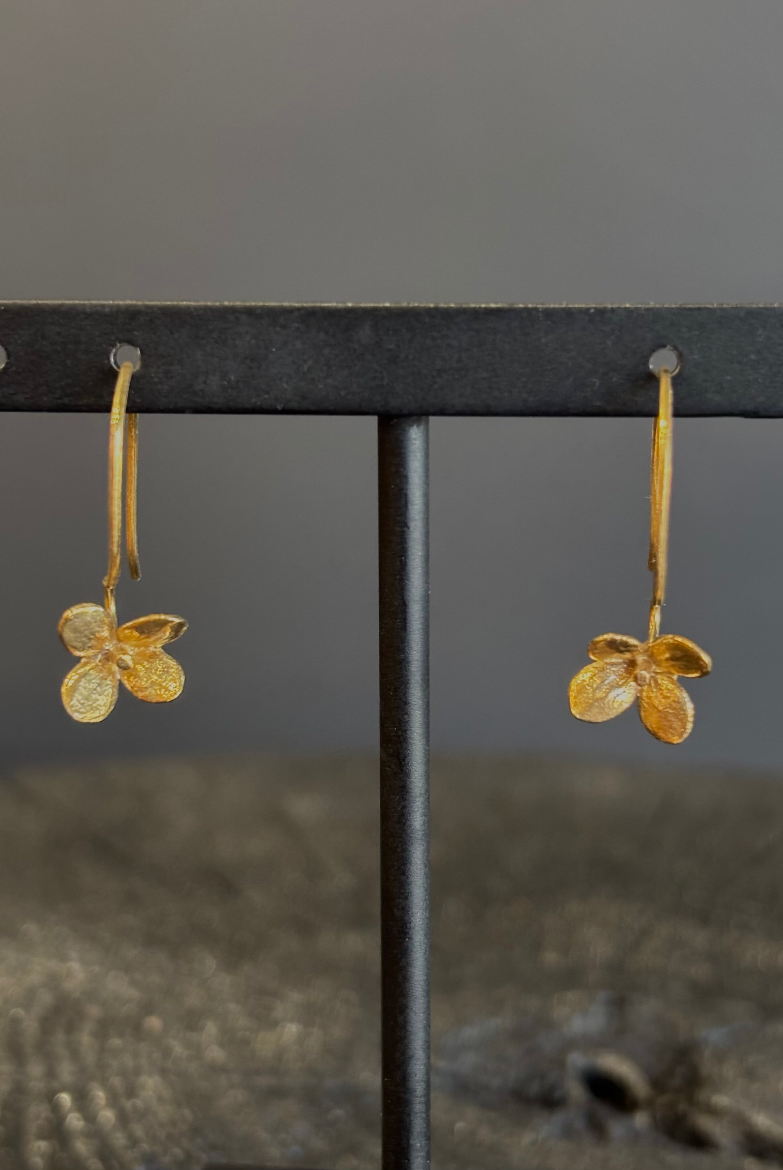 Image of Purslane Rosette Hoop Earrings from North Carolina fine jewelry artist Amber Mahler handcrafted in 18K yellow gold vermeil cast directly from the purslane rosette