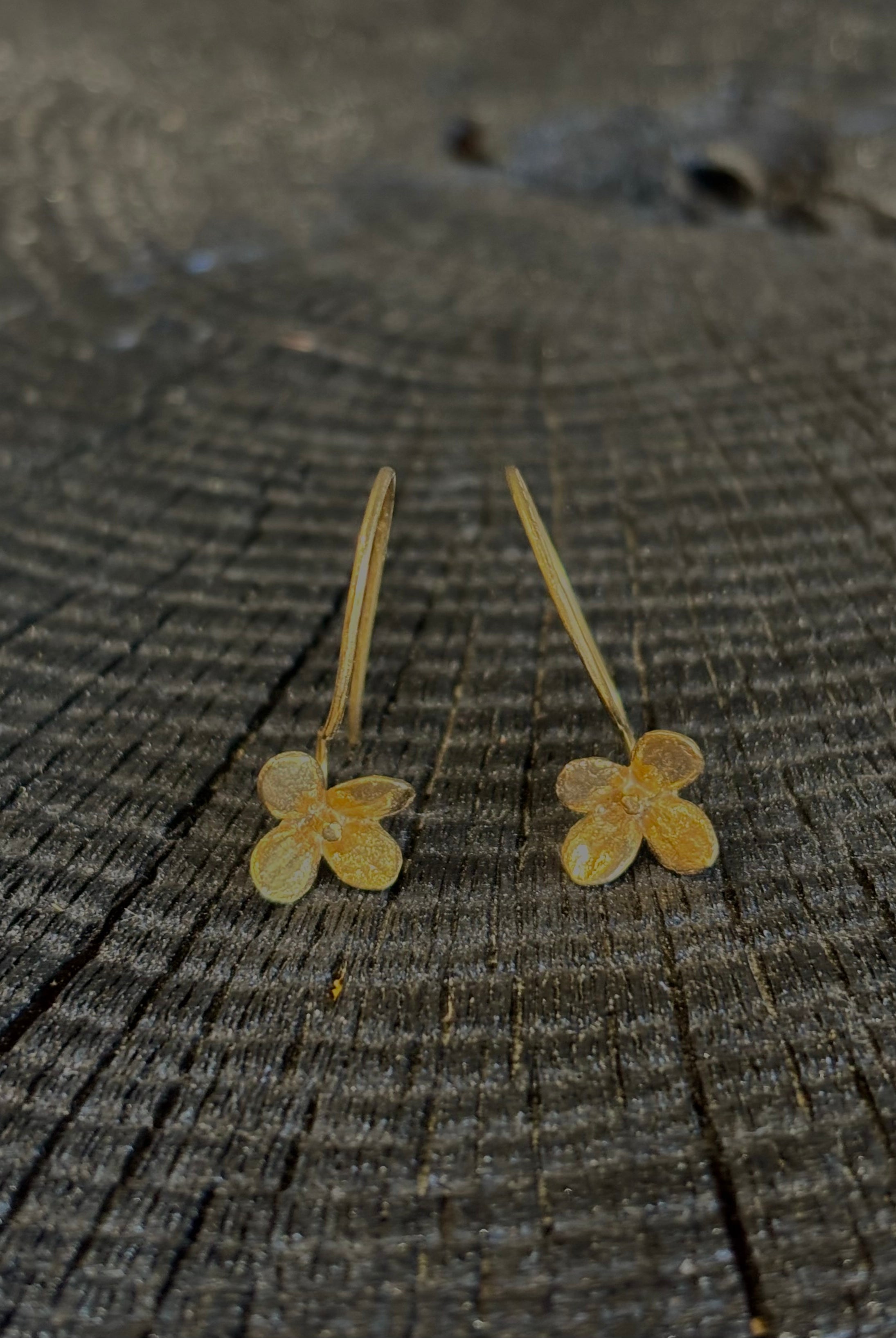 Image of Purslane Rosette Hoop Earrings from North Carolina fine jewelry artist Amber Mahler handcrafted in 18K yellow gold vermeil cast directly from the purslane rosette