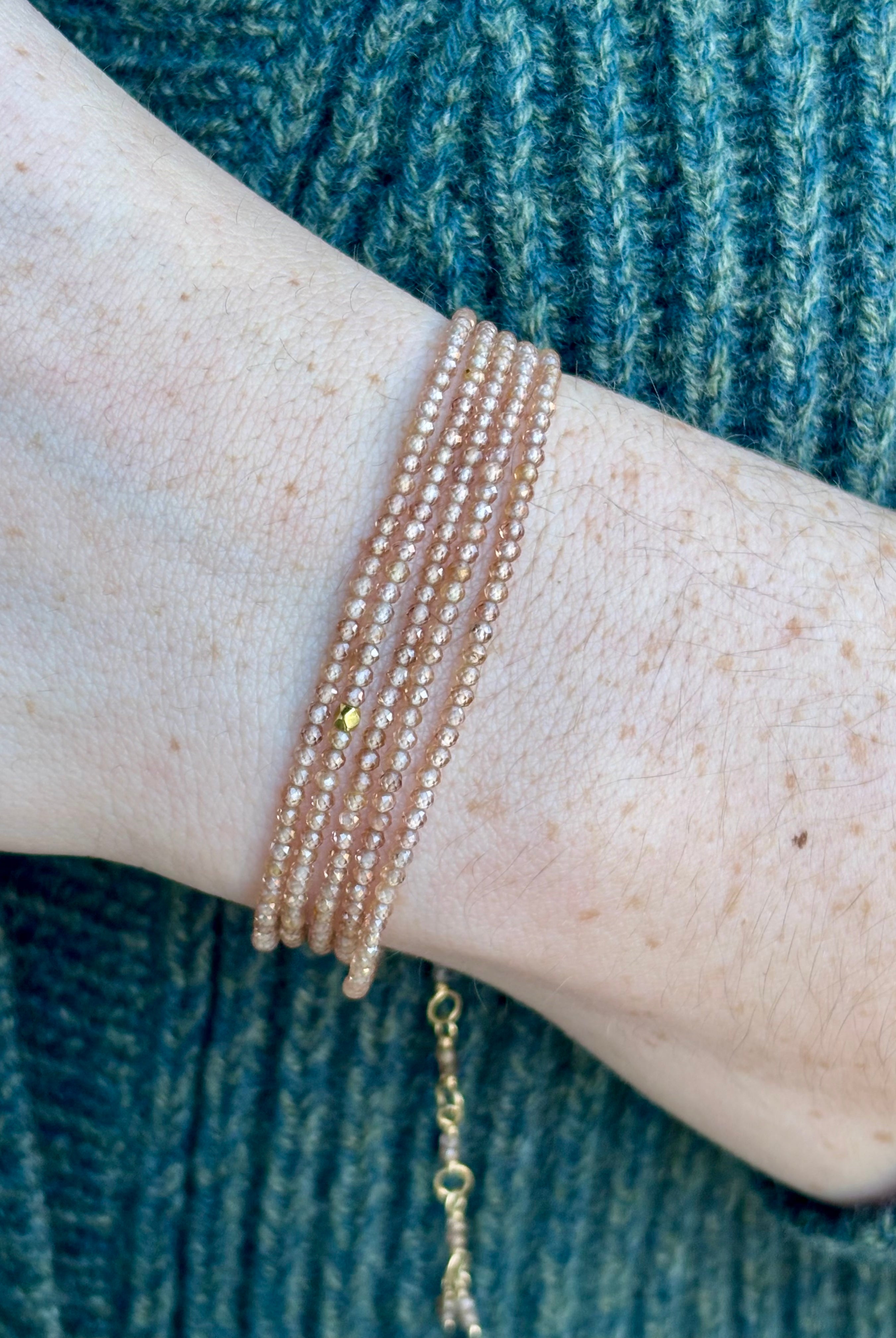 Brown zircon bracelet by fine jewelry artist Anne Sportun that can be worn as a bracelet or necklace with 18k yellow gold