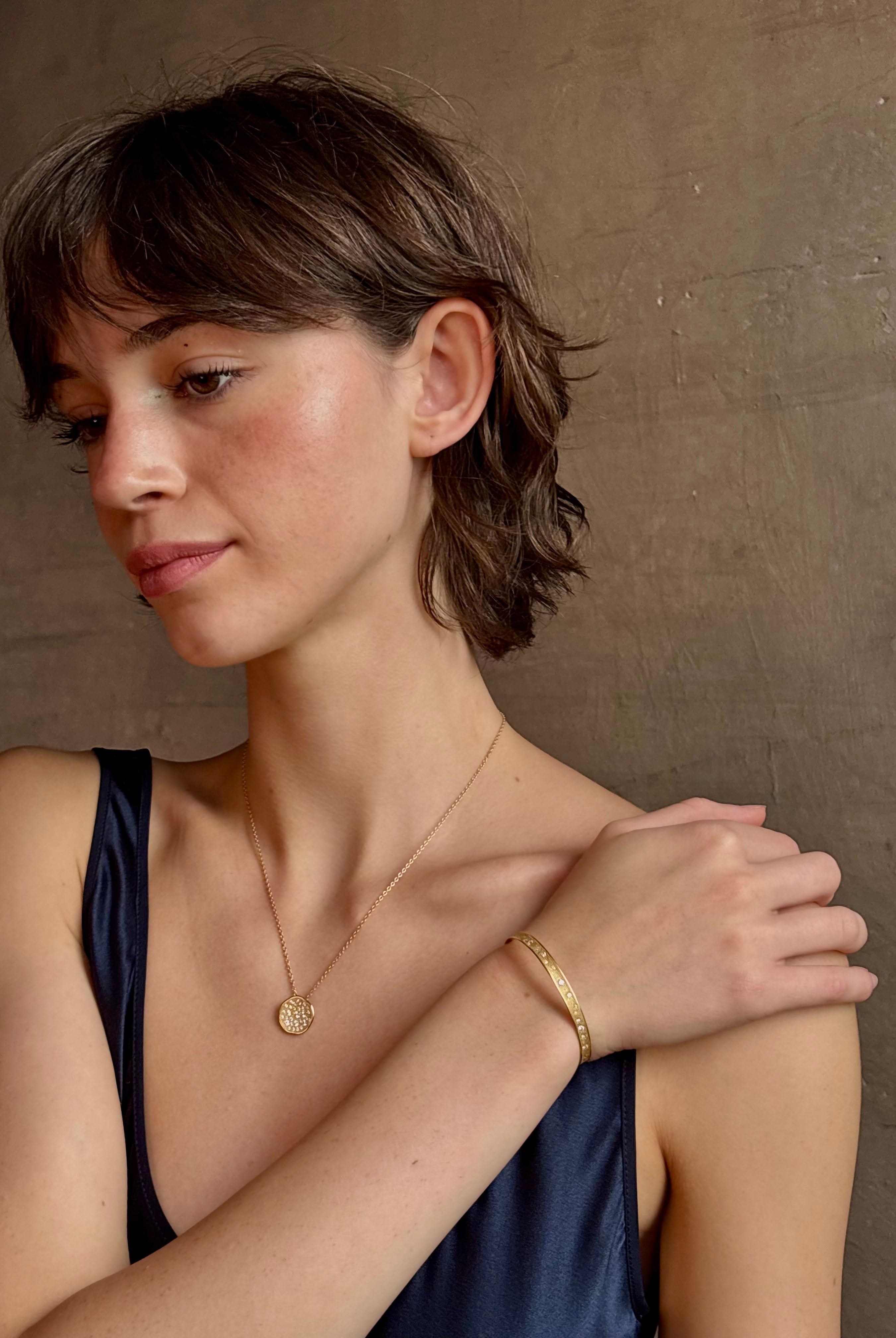 Gold Stardust circular 18k yellow gold Pendant Necklace by fine jewelry artist Anne Sportun with 29 round brilliant-cut diamonds