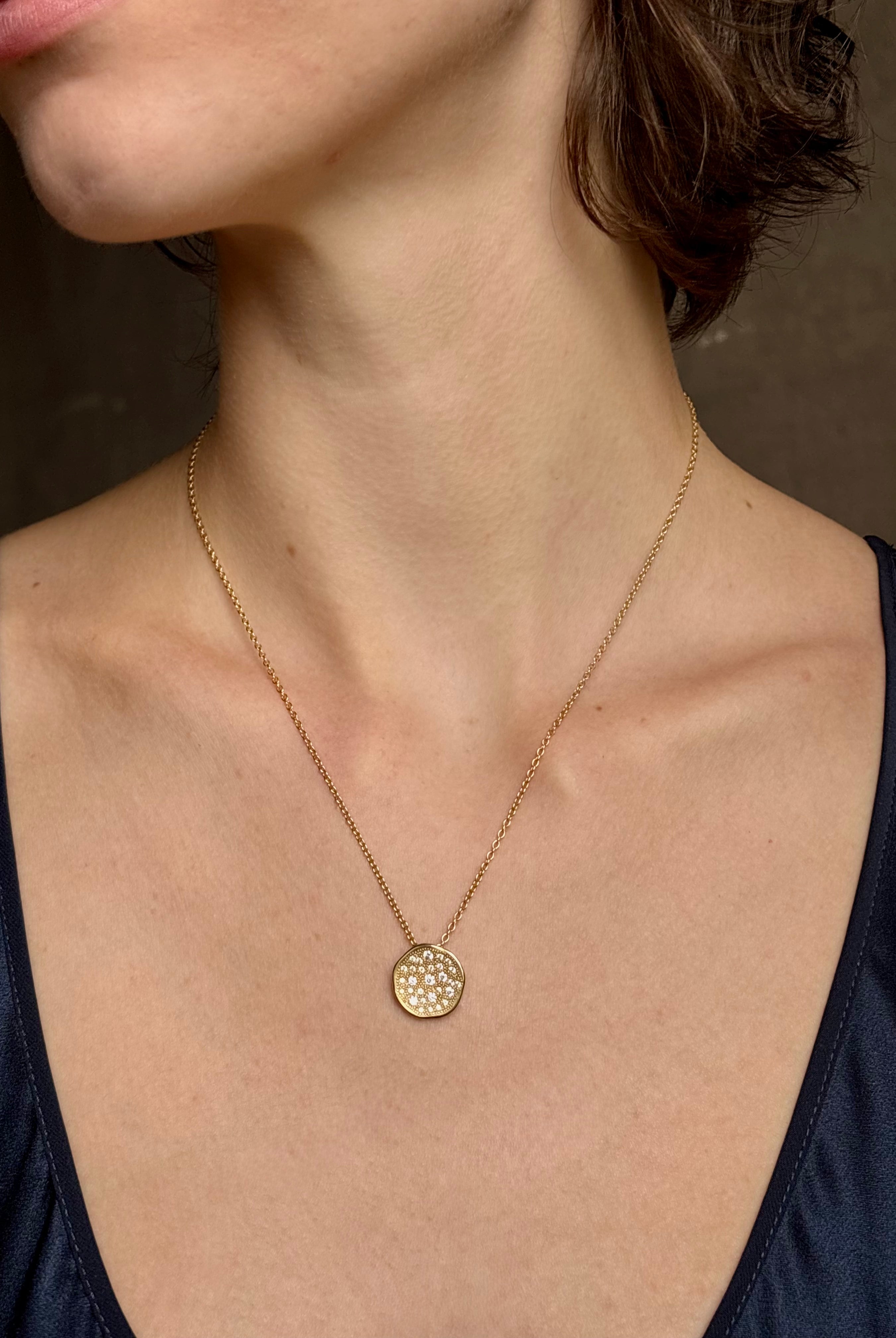 Gold Stardust circular 18k yellow gold Pendant Necklace by fine jewelry artist Anne Sportun with 29 round brilliant-cut diamonds