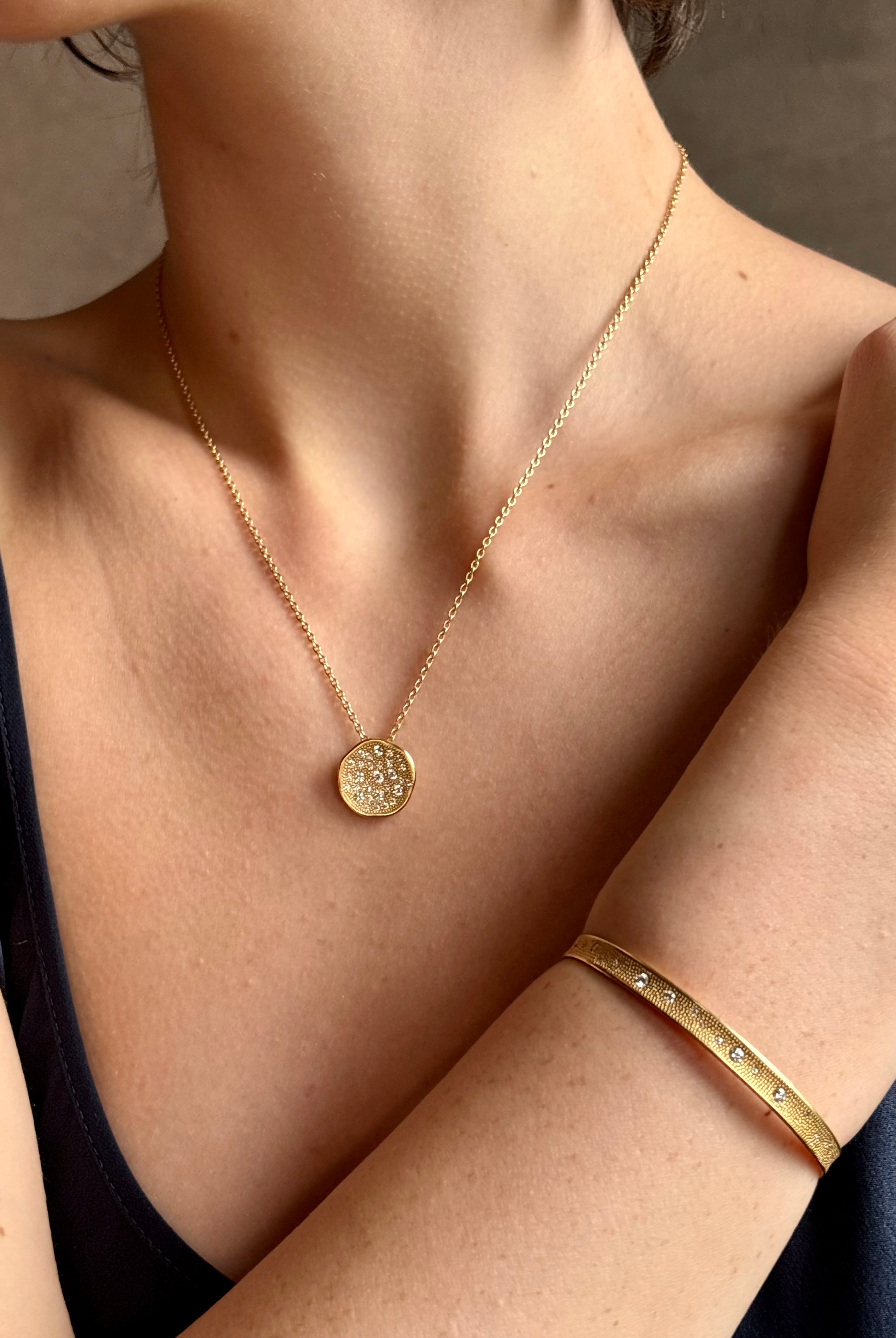 Gold Stardust circular 18k yellow gold Pendant Necklace by fine jewelry artist Anne Sportun with 29 round brilliant-cut diamonds
