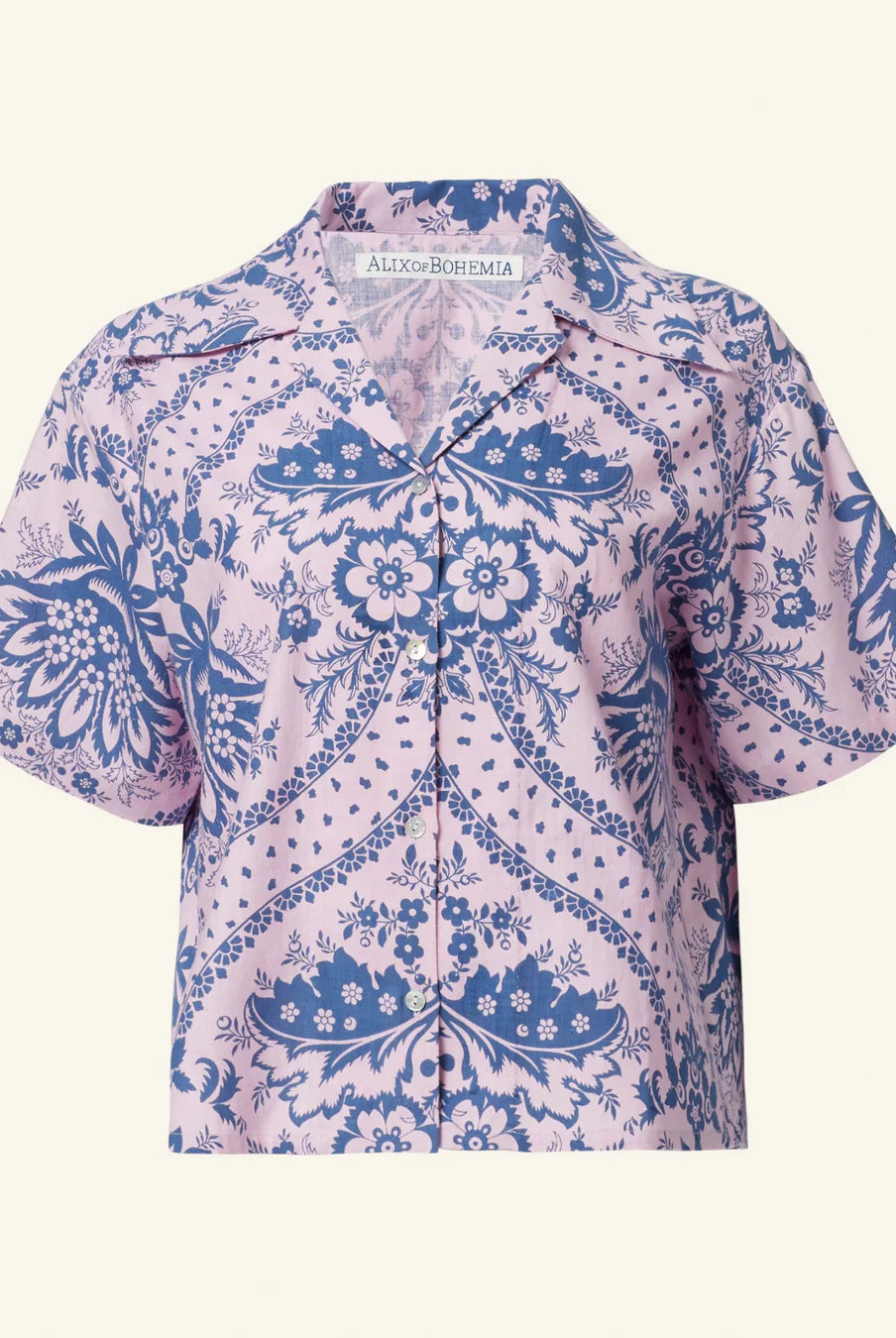Alix of Bohemia Stevie Oasis cotton top with a button front, short sleeves in a Pink and Blue print.