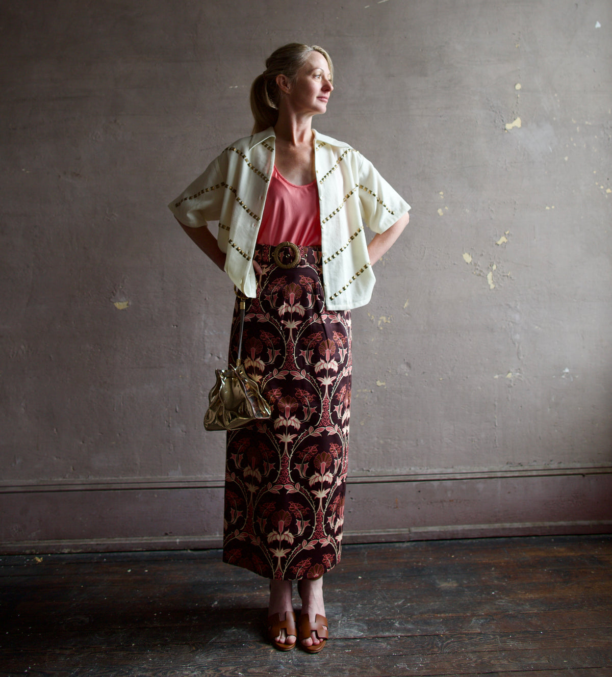 Mature woman wearing Alix of Bohemia Stevie Studded wool top open for warm layering over tank top and luxe look