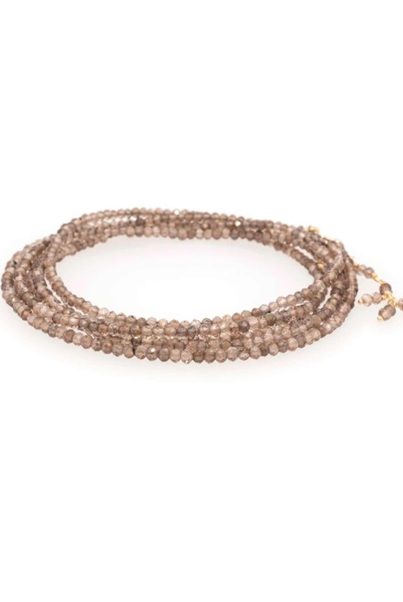 Image featuring a handmade champagne garnet bracelet by Anne Sportun that can be worn as a bracelet or necklace with 18k yellow gold.