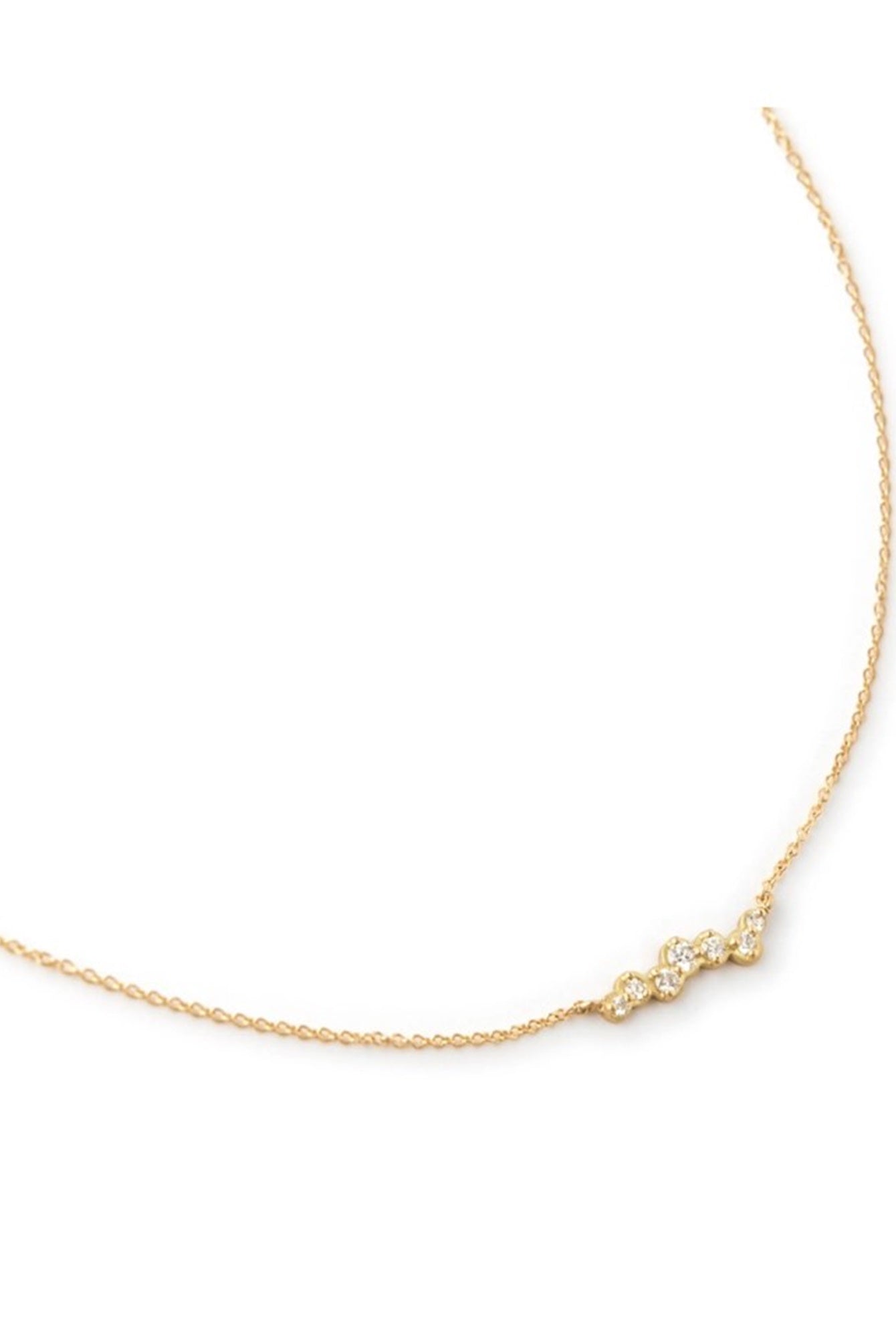 Image featuring artist Anne Sportun Cascade Diamond Necklace with uneven row of diamonds and fabricated in 18k yellow gold