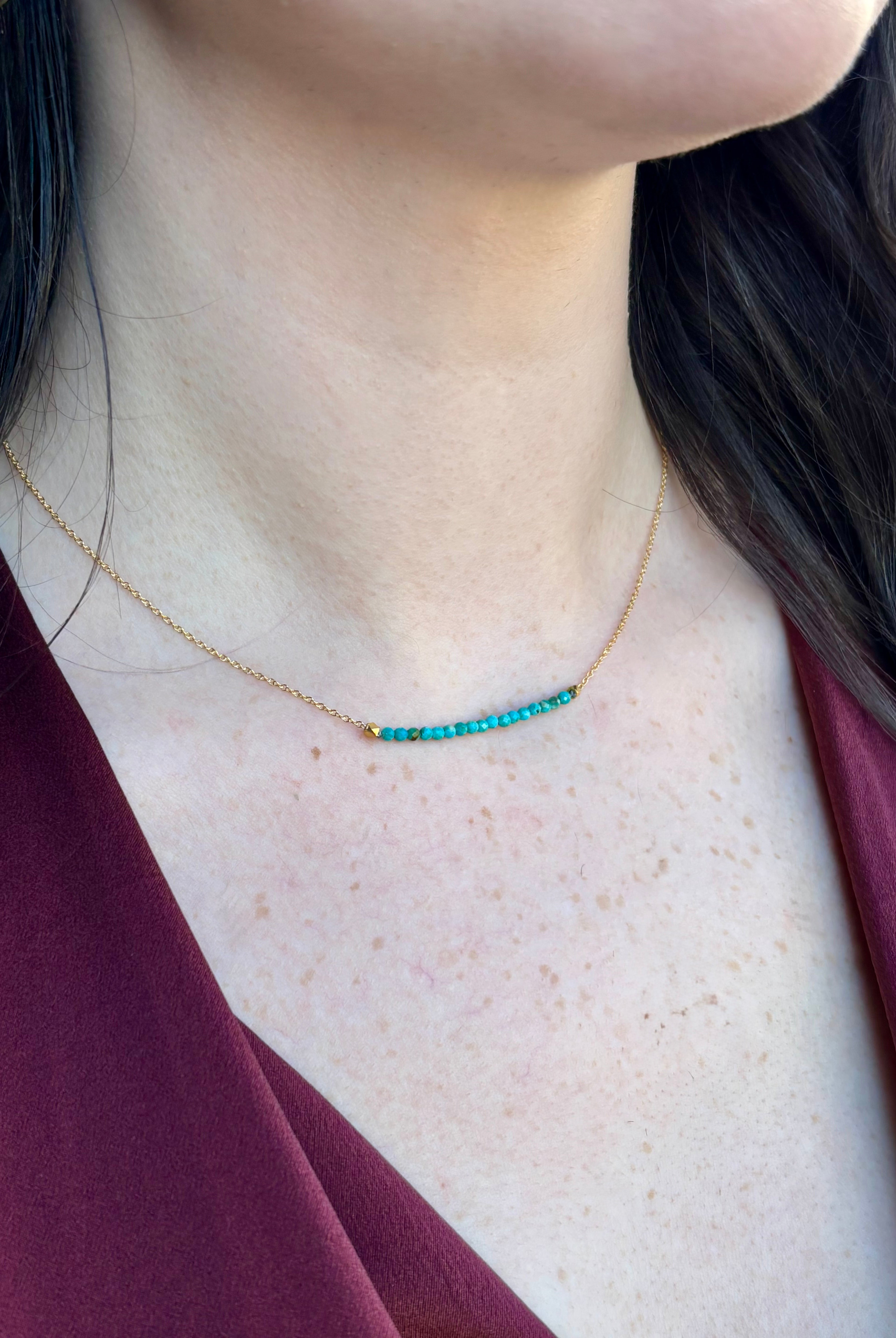 Image of woman wearing fine jewelry designer ANNE SPORTUN Centre Turquoise and 18k yellow gold Wrap Necklace