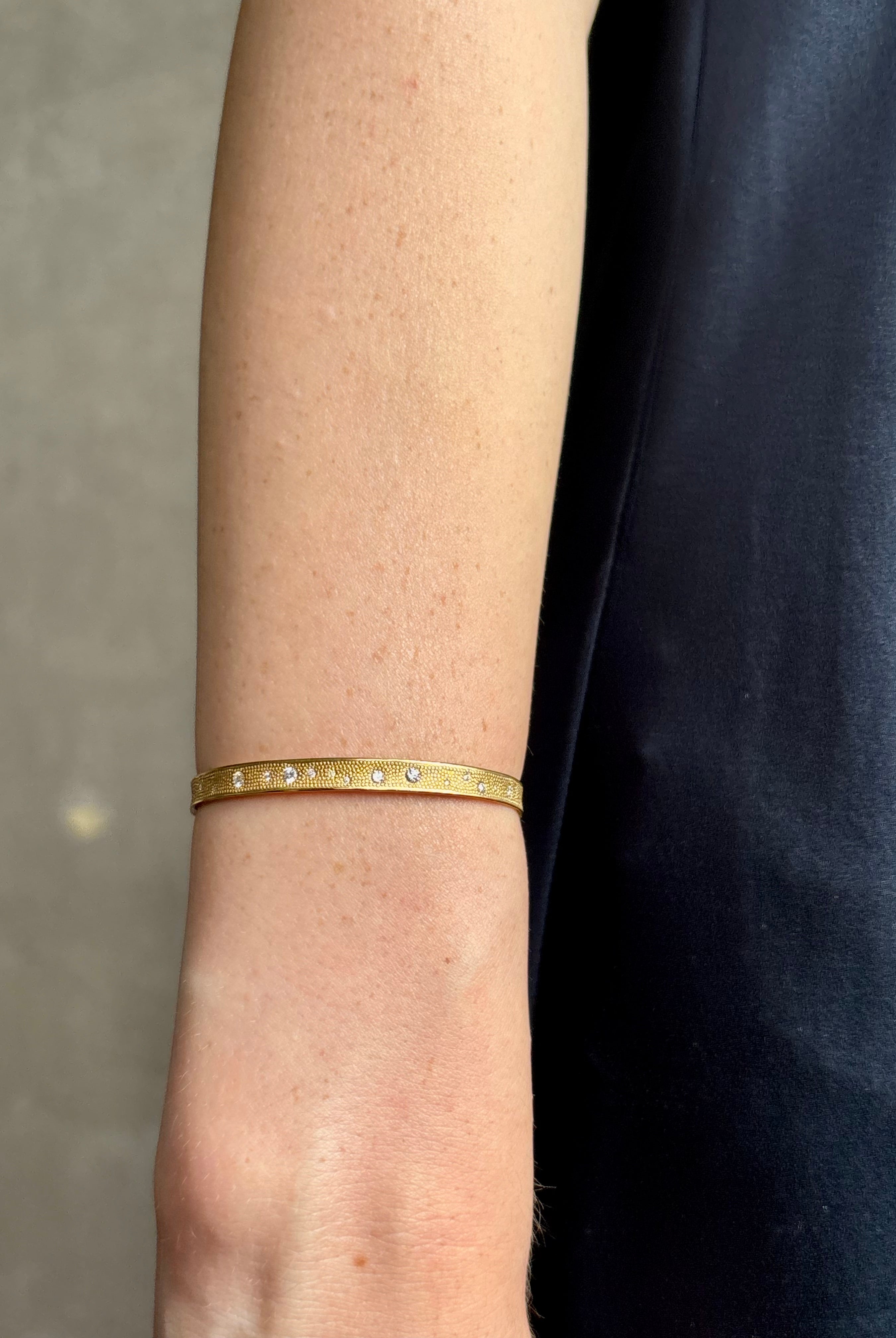 18k yellow gold diamond cuff by fine jewelry artist Anne Sportun with 31 round brilliant cut G/VS diamonds