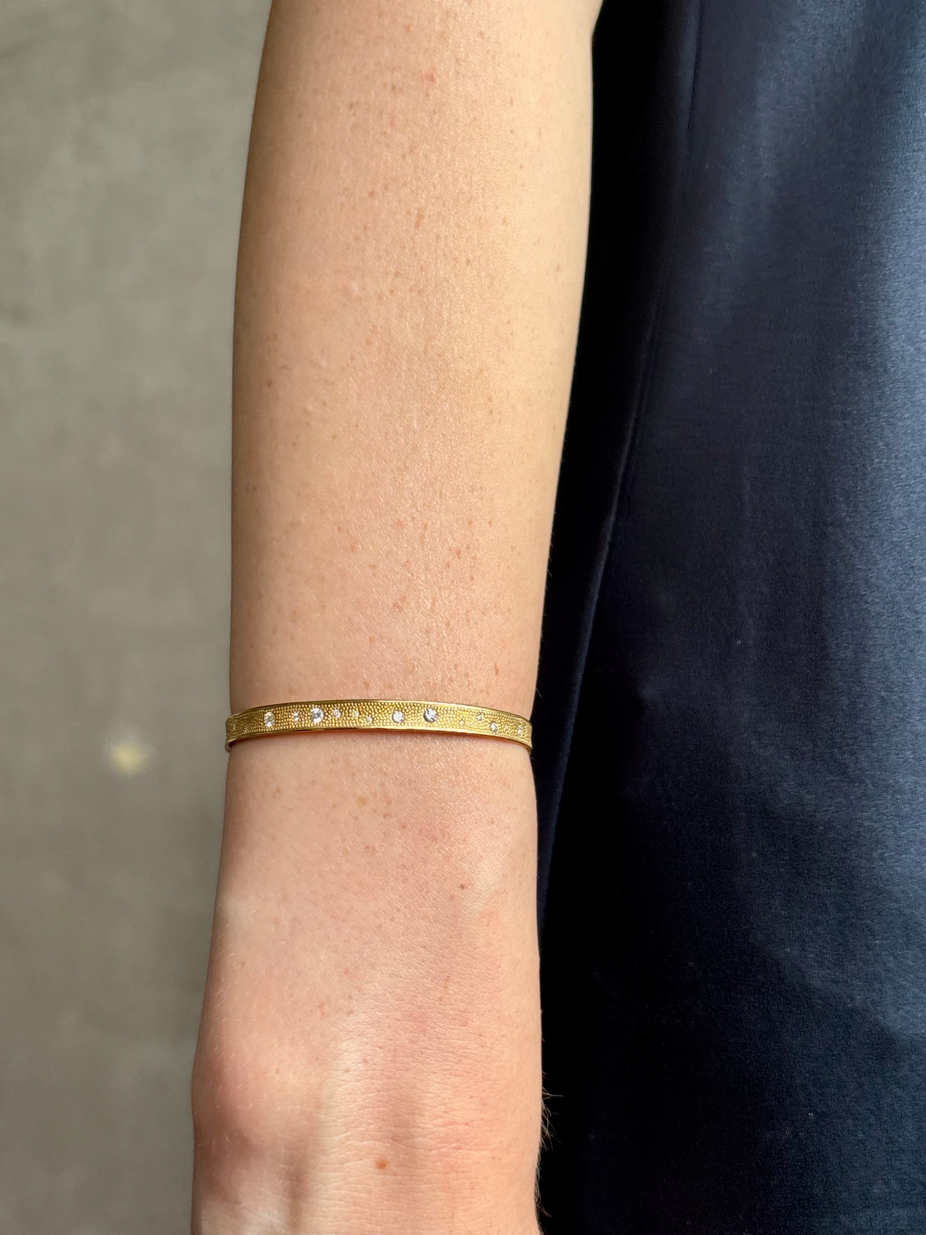 18k yellow gold diamond cuff by fine jewelry artist Anne Sportun with 31 round brilliant cut G/VS diamonds