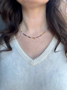 Image of woman wearing fine jewelry designer ANNE SPORTUN Multi-Sapphire and Diamond Necklace in 18K Yellow Gold