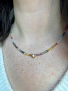 Close up image of woman wearing fine jewelry designer ANNE SPORTUN Multi-Sapphire and Diamond Necklace in 18K Yellow Gold