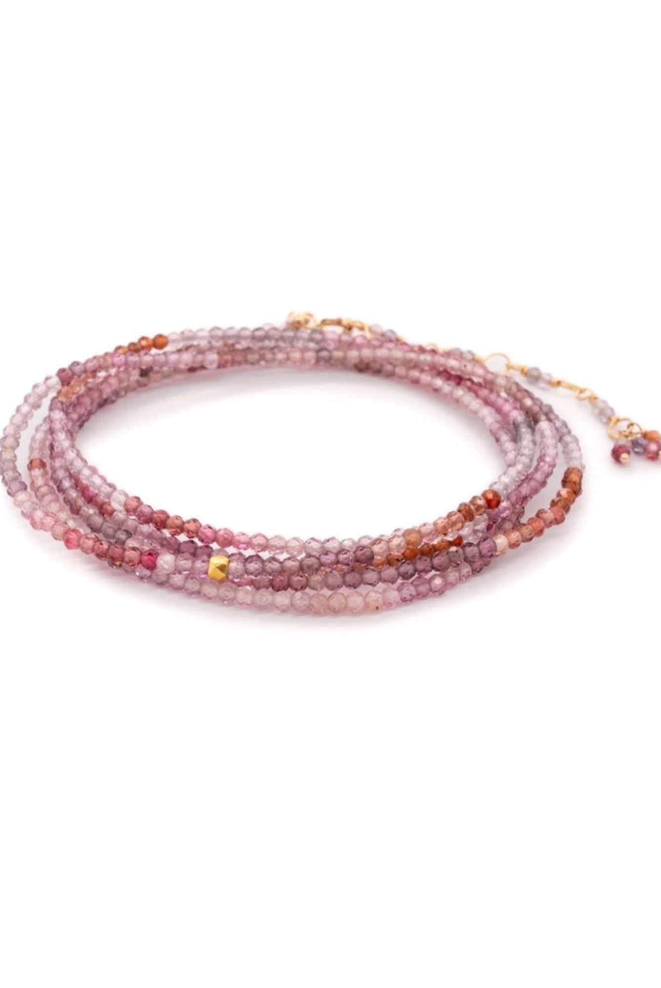 Image featuring a handmade multicolored spinel bracelet by Anne Sportun that can be worn as a bracelet or necklace with 18k yellow gold.