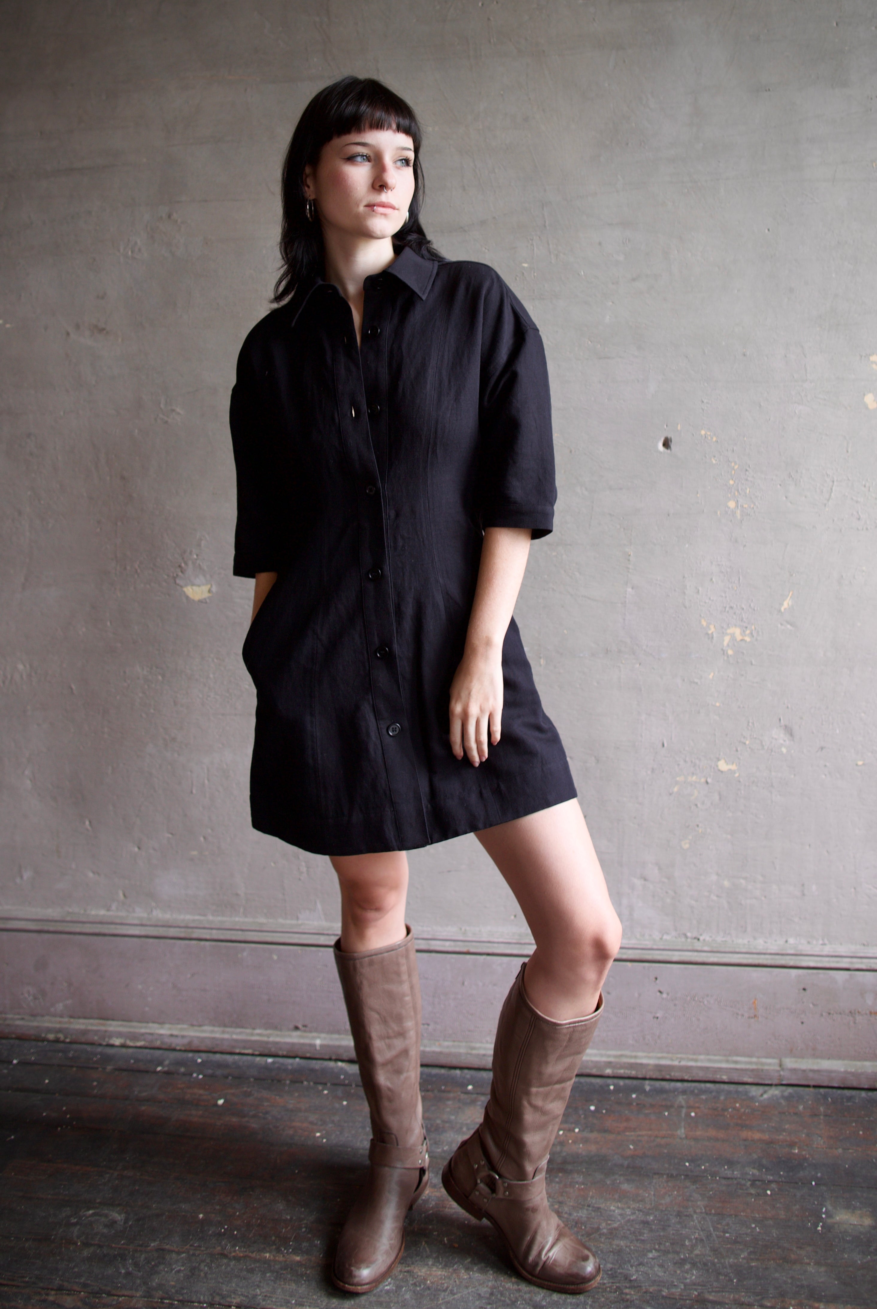 Model wearing comfortable Apiece Apart Luz black shirt mini dress with 3/4 sleeves in cotton and linen mix