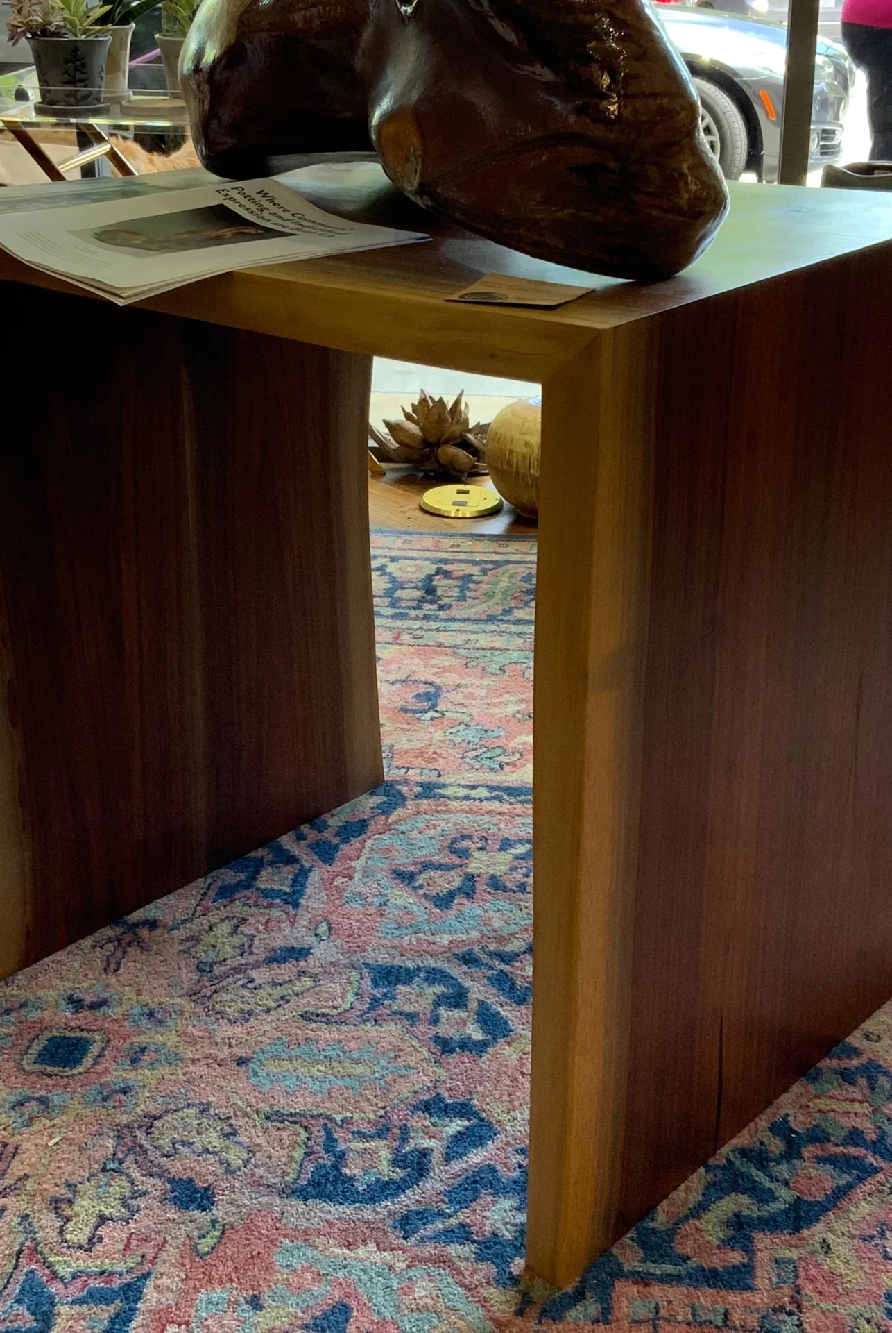 North Carolina handcrafted contemporary walnut waterfall wood table with a natural wood finish