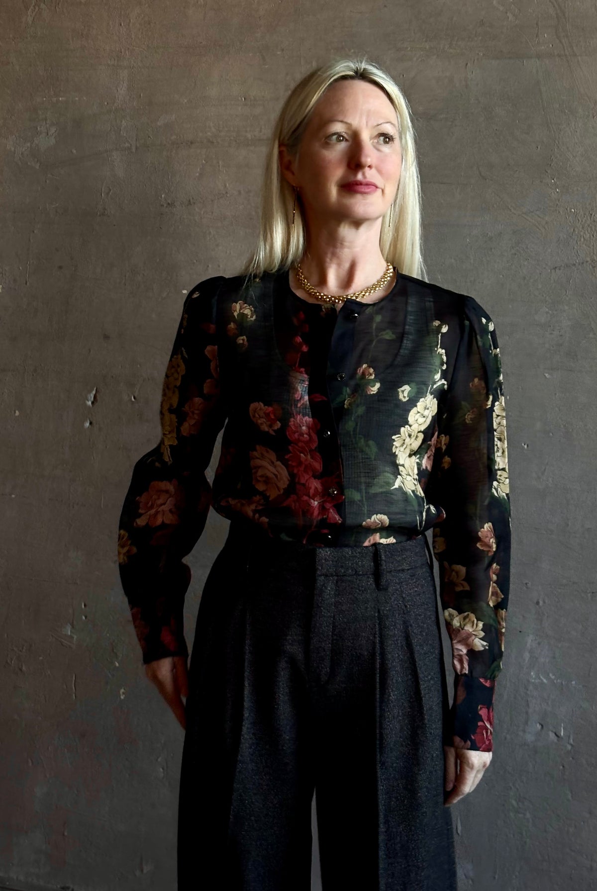 Mature woman wearing Cara Cara Chili Blouse in Meadows Black linen-silk crystal buttons Romantic dressmaker-quality statement blouse