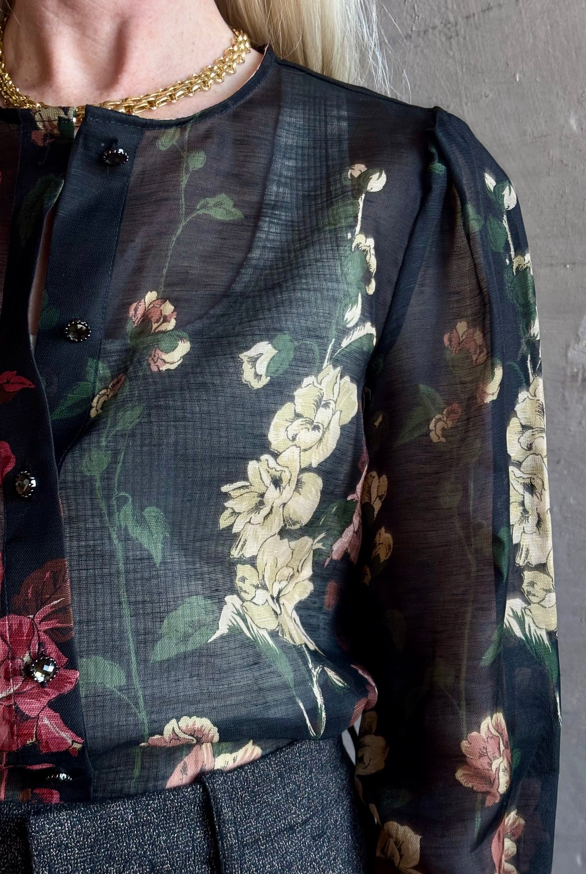 Mature woman wearing Cara Cara Chili Blouse in Meadows Black linen-silk crystal buttons Romantic dressmaker-quality occasion ready