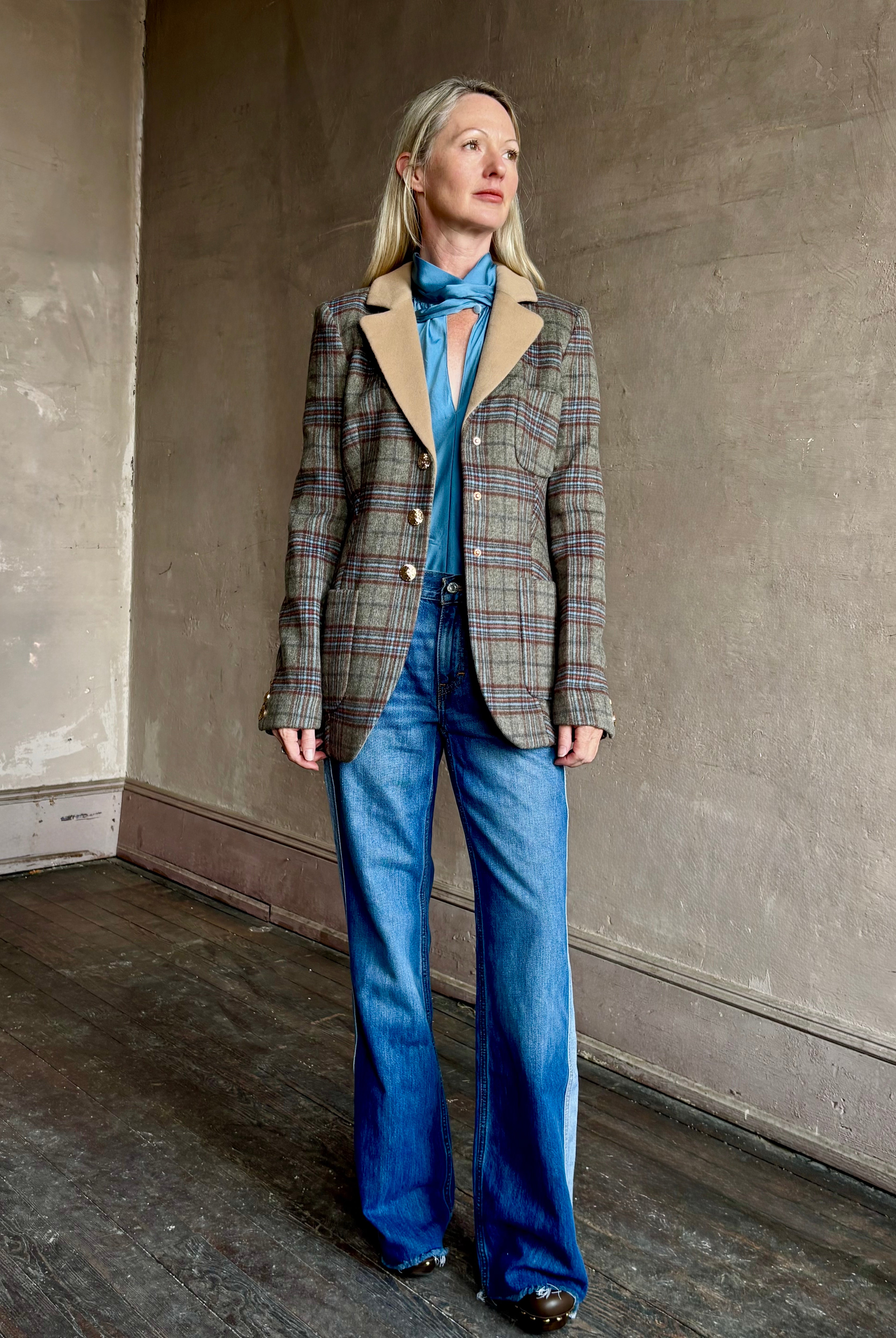 Image of woman wearing the Cara Cara Ross classic tailored Ross blazer with 3 buttons, front pockets, and contrasting lapel