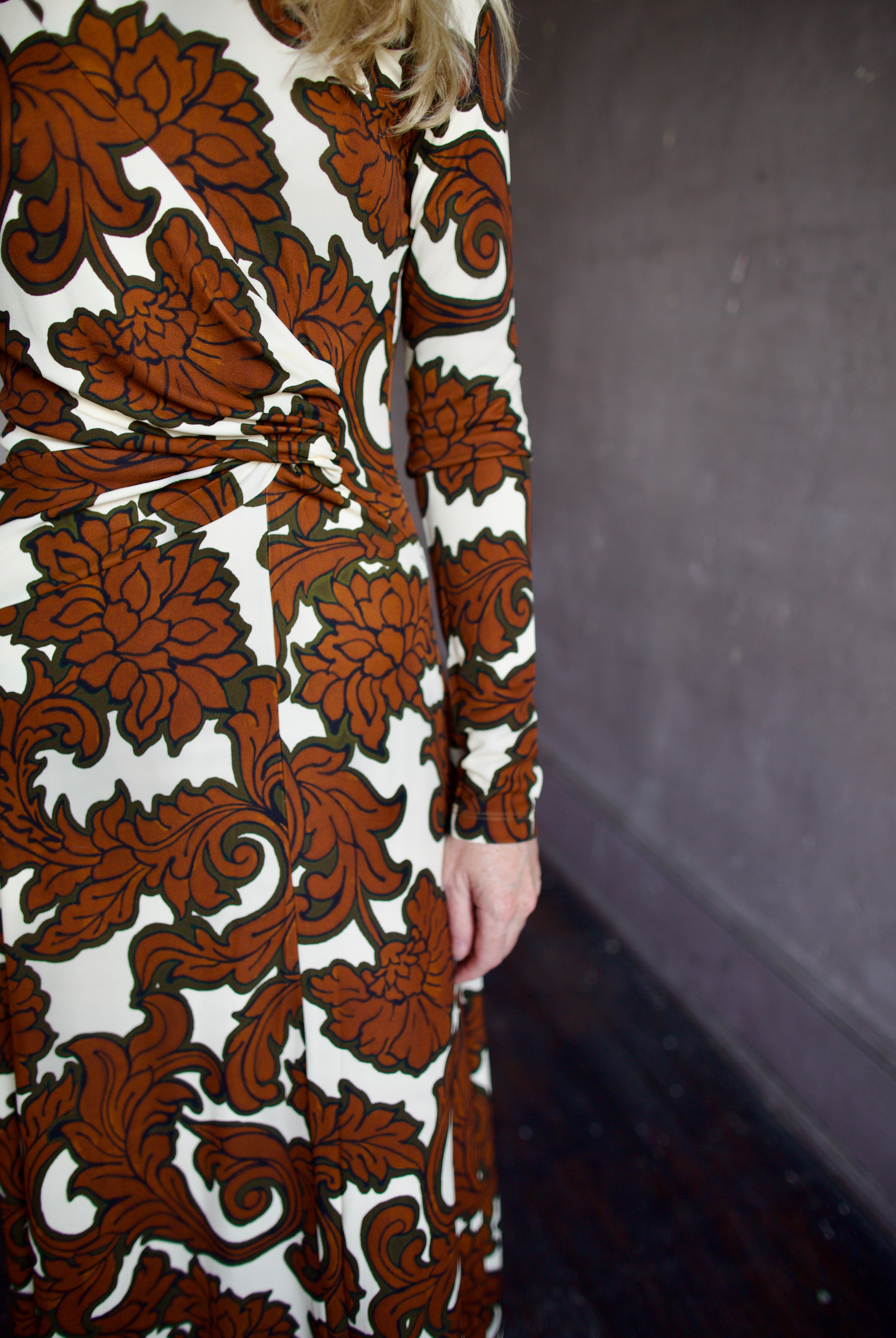 Model wearing the sophisticated patterned Hera dress by Cara Cara with a flattering A-line silhouette