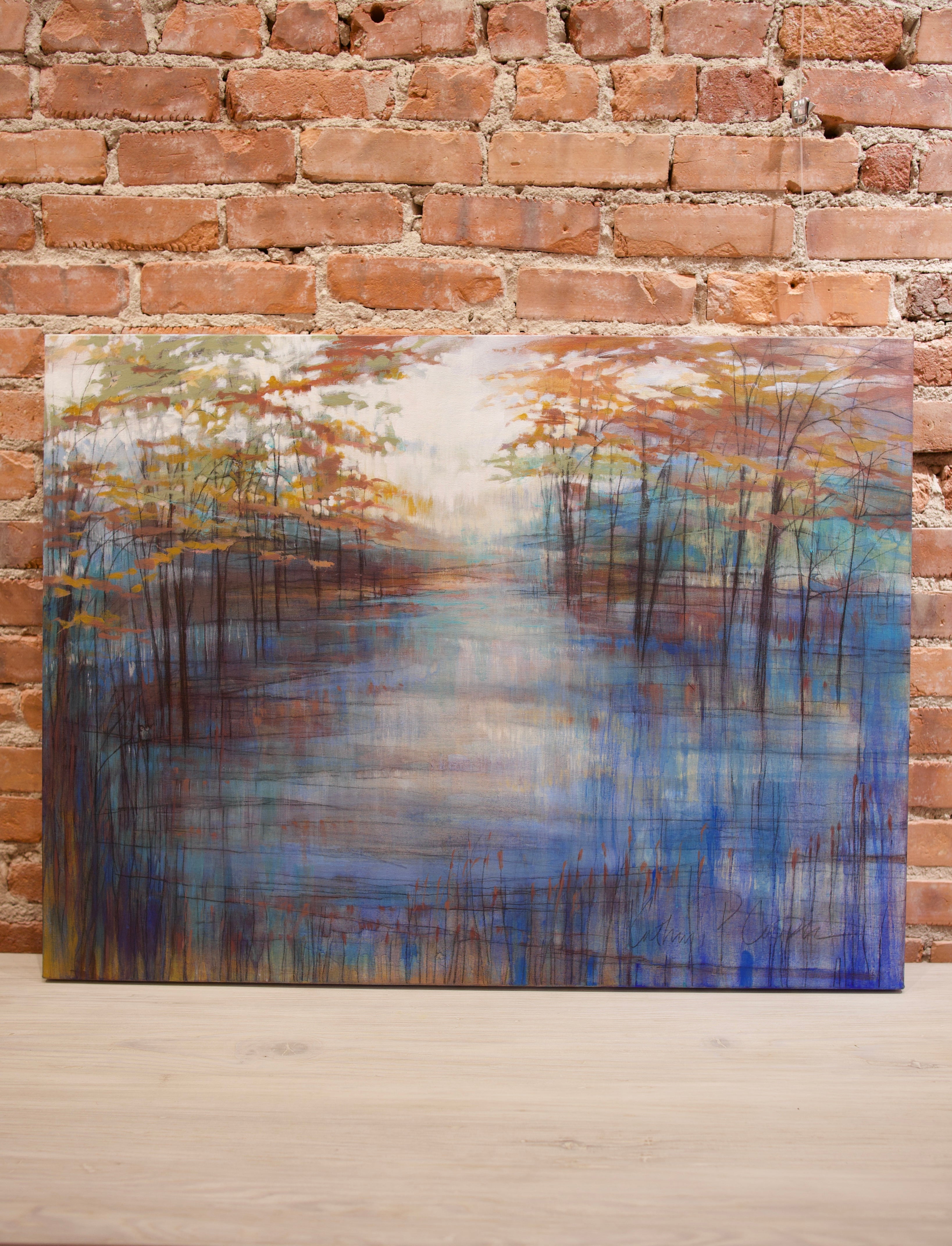 Original Acrylic and graphite painting by North Carolina Artist Cathryn Cooper depicting fall foliage on the water’s edge with a clear white sky.