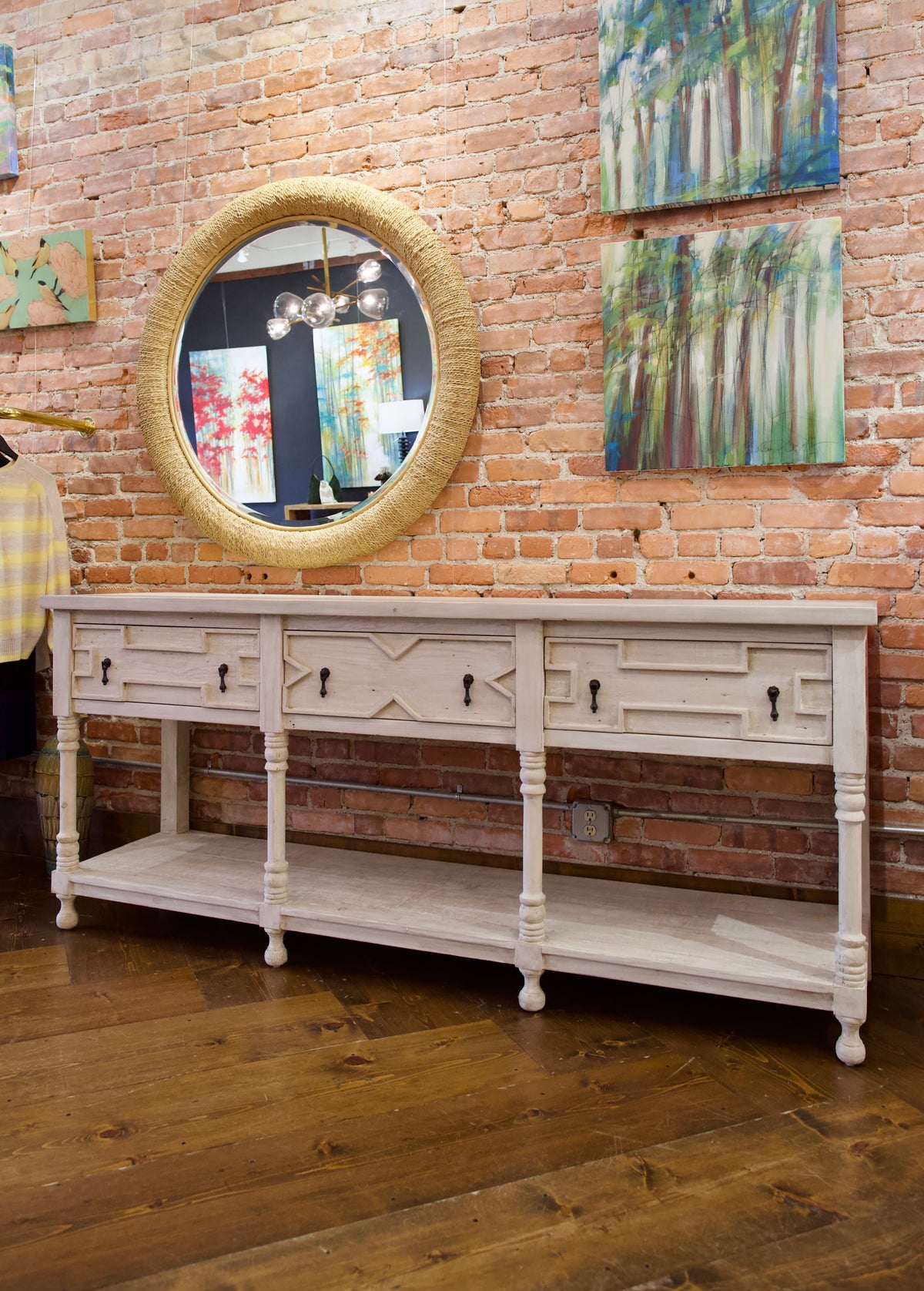 A white reclaimed douglas fir wood sideboard with three drawers and a bottom shelf raised drawer details hand crafted in USA