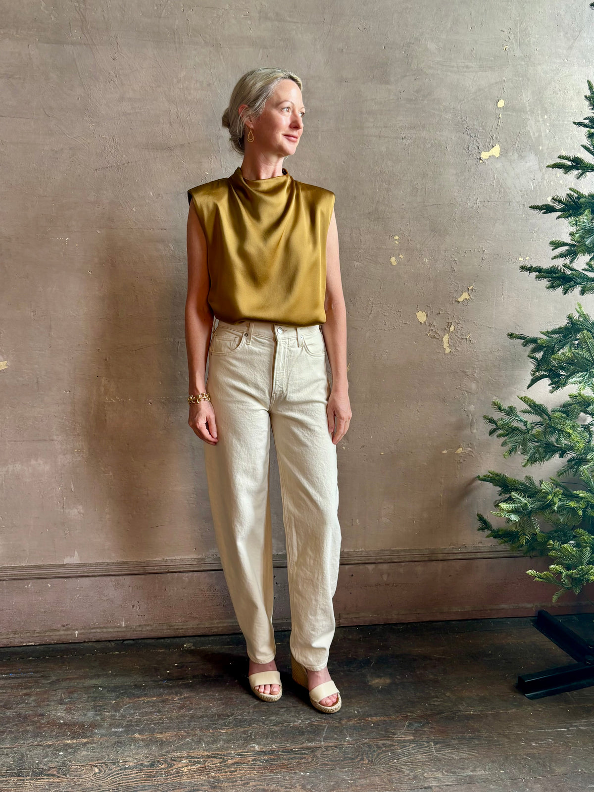 woman wearing luxury Italian designer FORTE FORTE Envers Satin Crater-Neck sleeveless Shirt matte Antique Gold