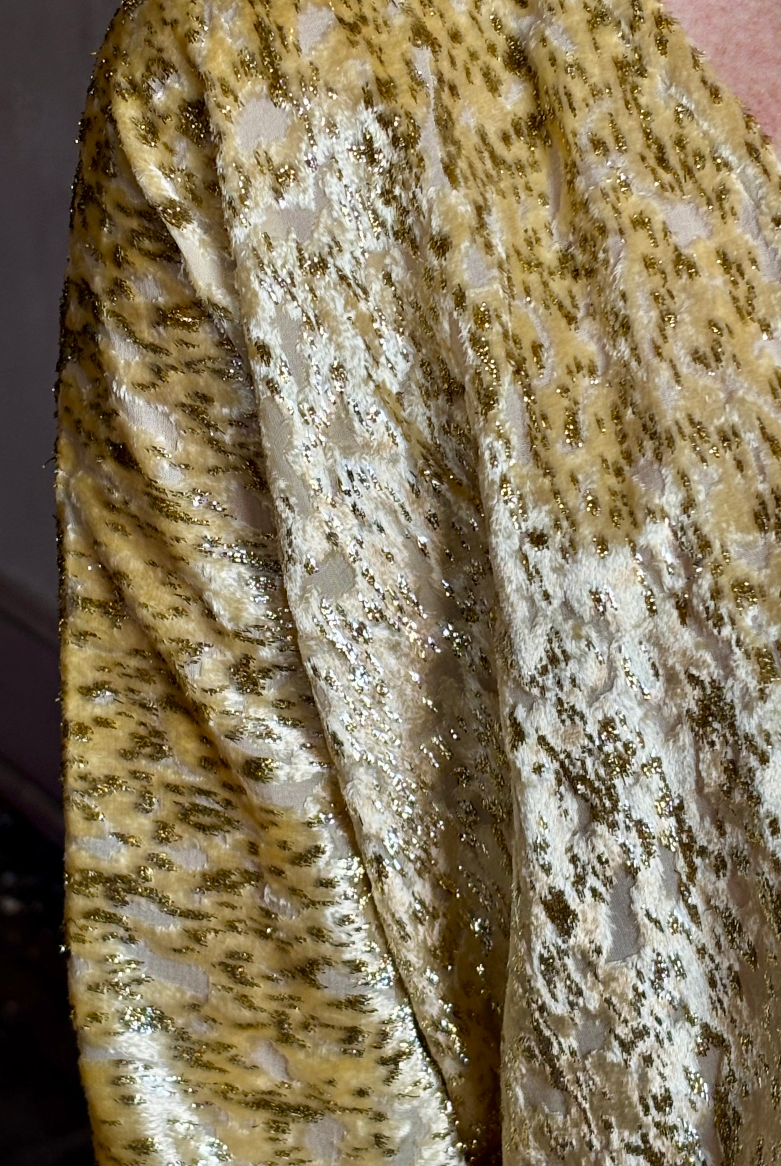 Image of mature woman wearing luxury Italian designer FORTE FORTE En Rêve Fil-Coup metallic velvet honey Shirt with V-neck and long sleeves