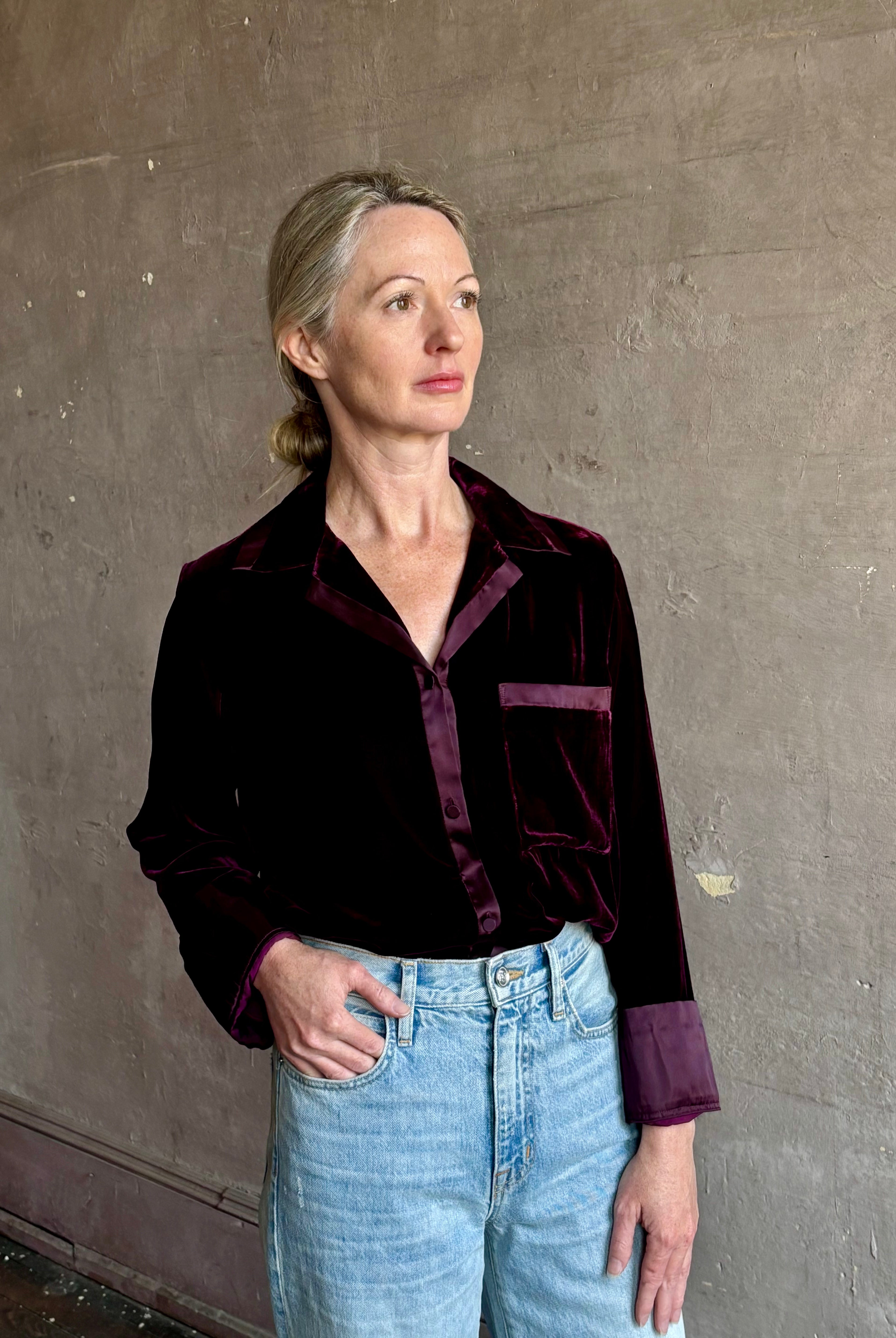 Image of mature woman wearing luxury Italian designer FORTE FORTE Velvet Button-Down Shirt in Bordeaux with Pajama-Inspired Boho Blouse