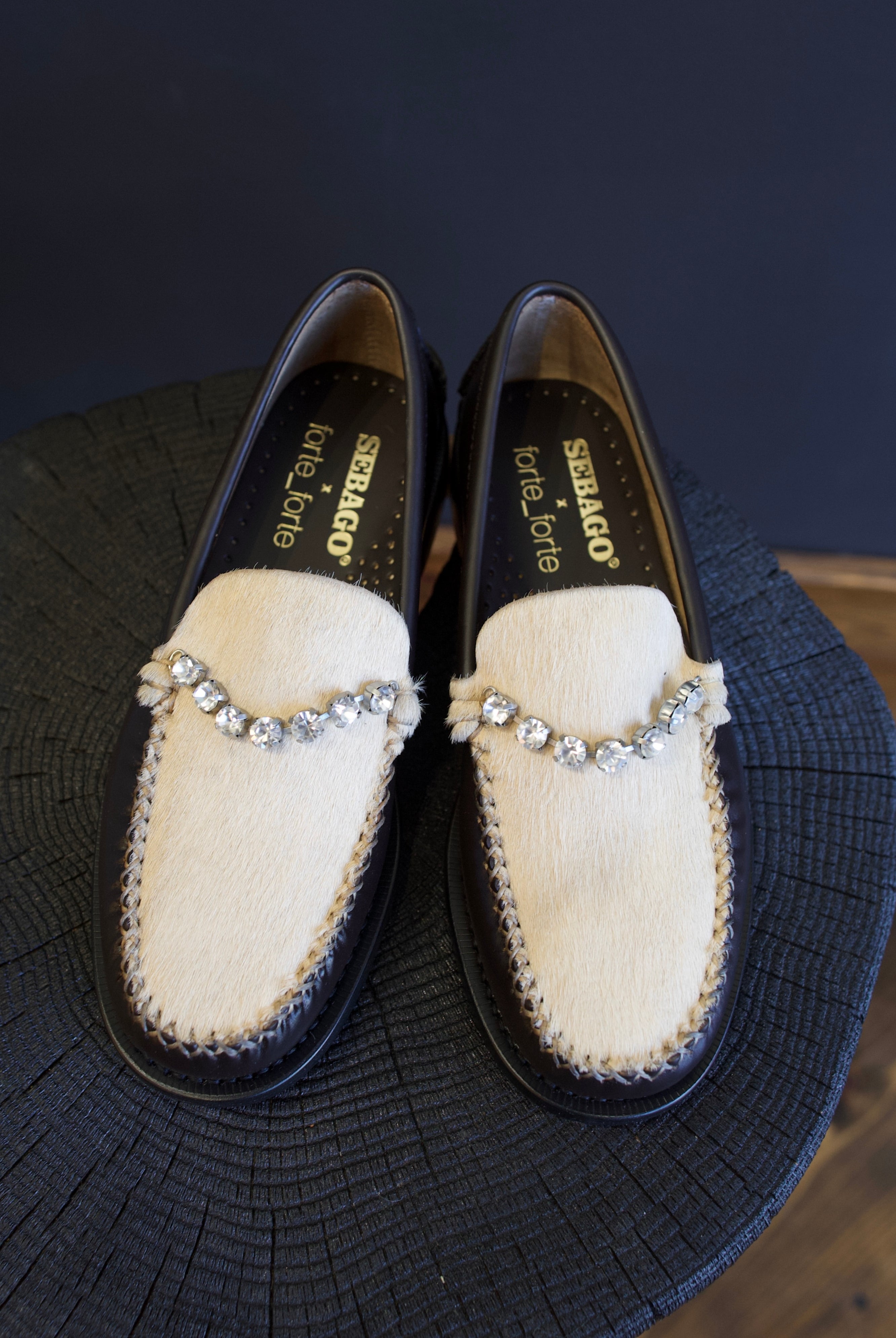 Image featuring the Forte Forte collaboration loafers with Sebago. They are brown leather with ivory horsehair accents and rhinestone detailing.