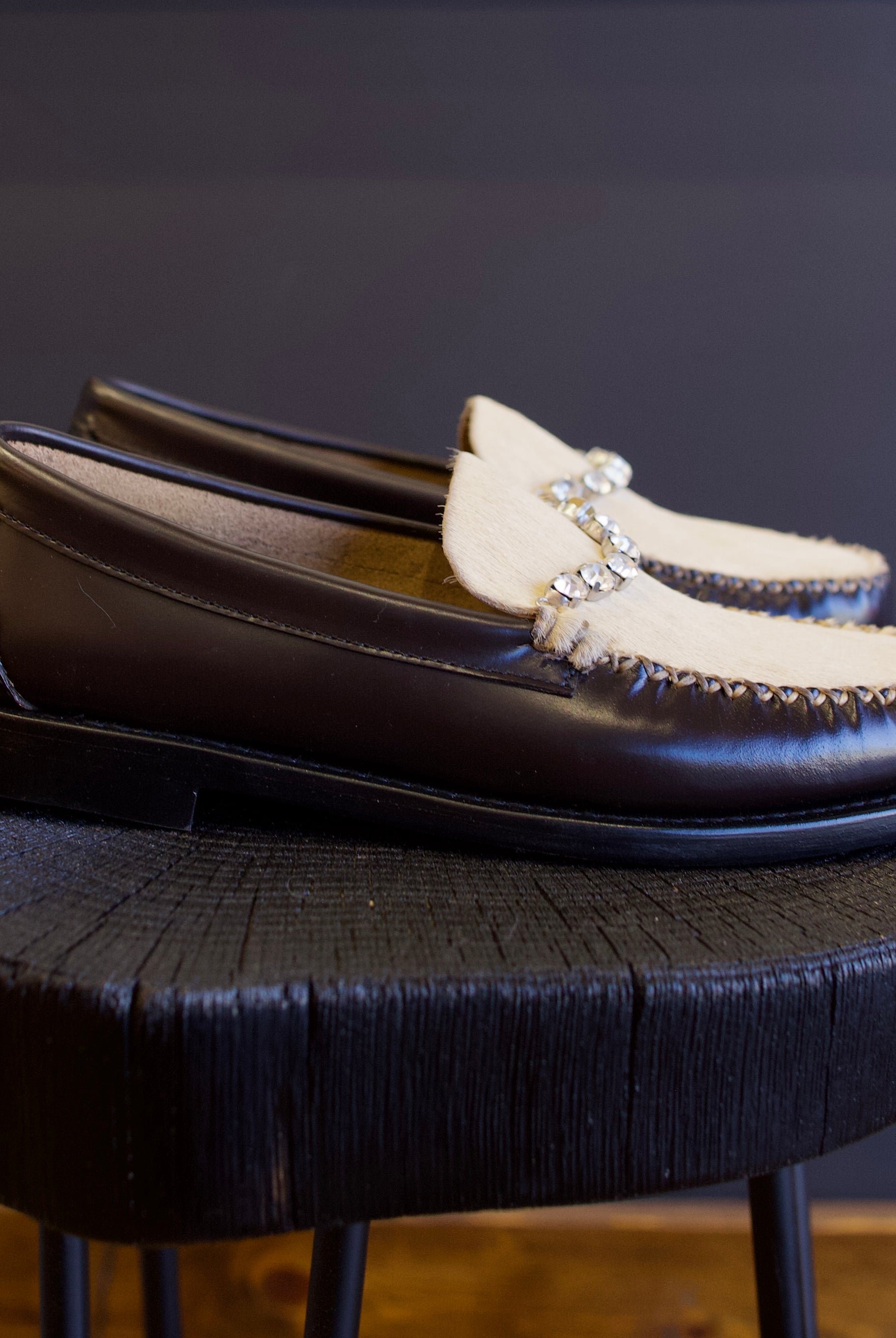 Image featuring the Forte Forte collaboration loafers with Sebago. They are brown leather with ivory horsehair accents and rhinestone detailing.