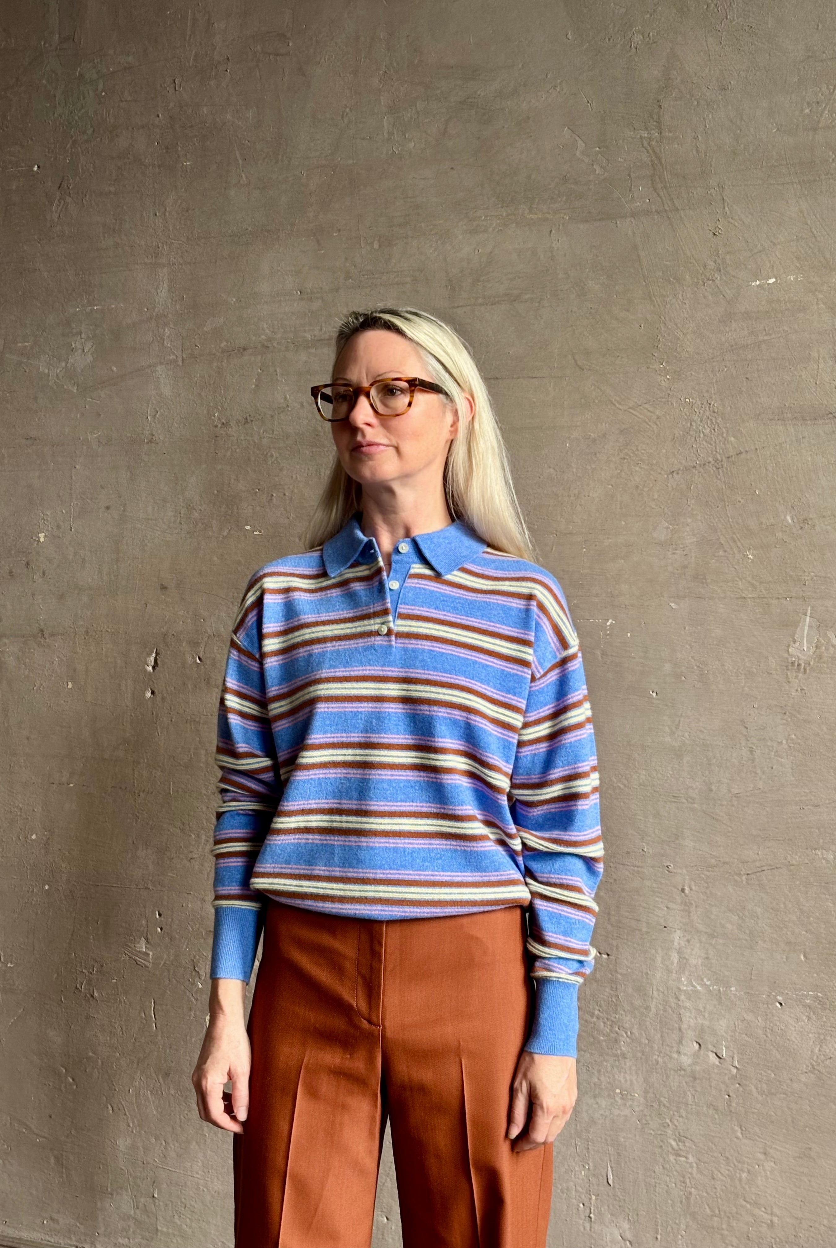 Mature woman wearing Guest in Residence Colliegate Delft Blue sienna yellow striped cashmere polo sweater