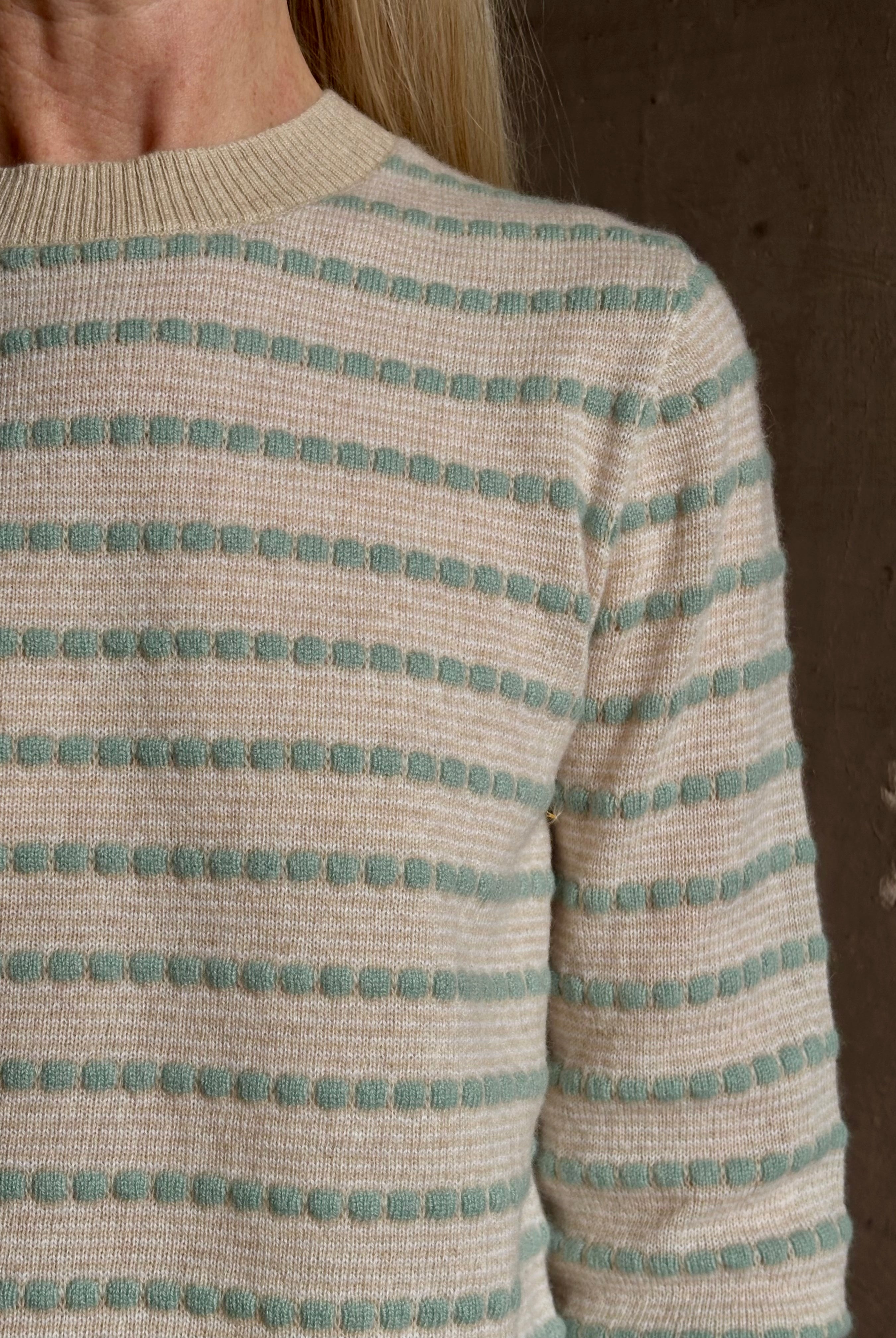 Mature woman wearing Guest in Residence Pebble sandstone dot stripe shrunken crew long sleeve cashmere