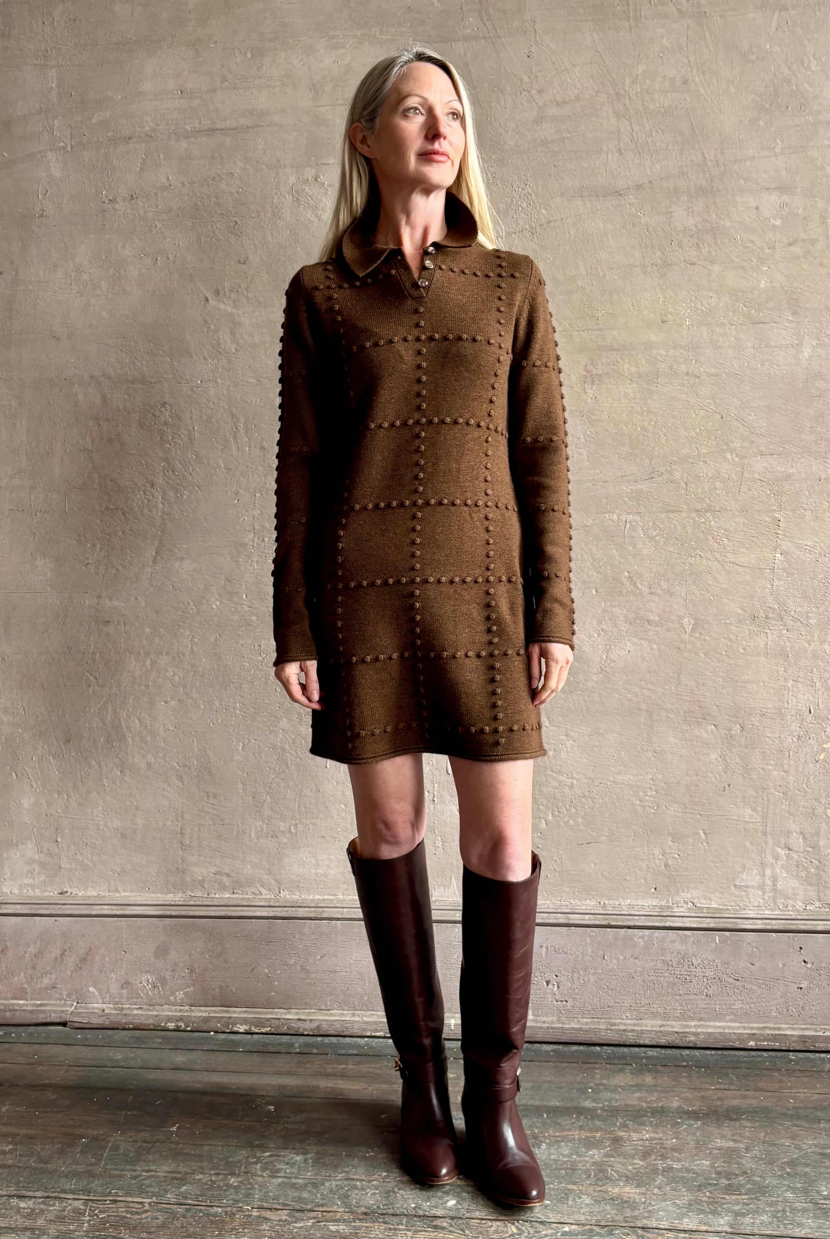 Image of mature woman wearing celebrity brand Guest in Residence Popcorn Polo long sleeve mini dress with a geometric patterned texture