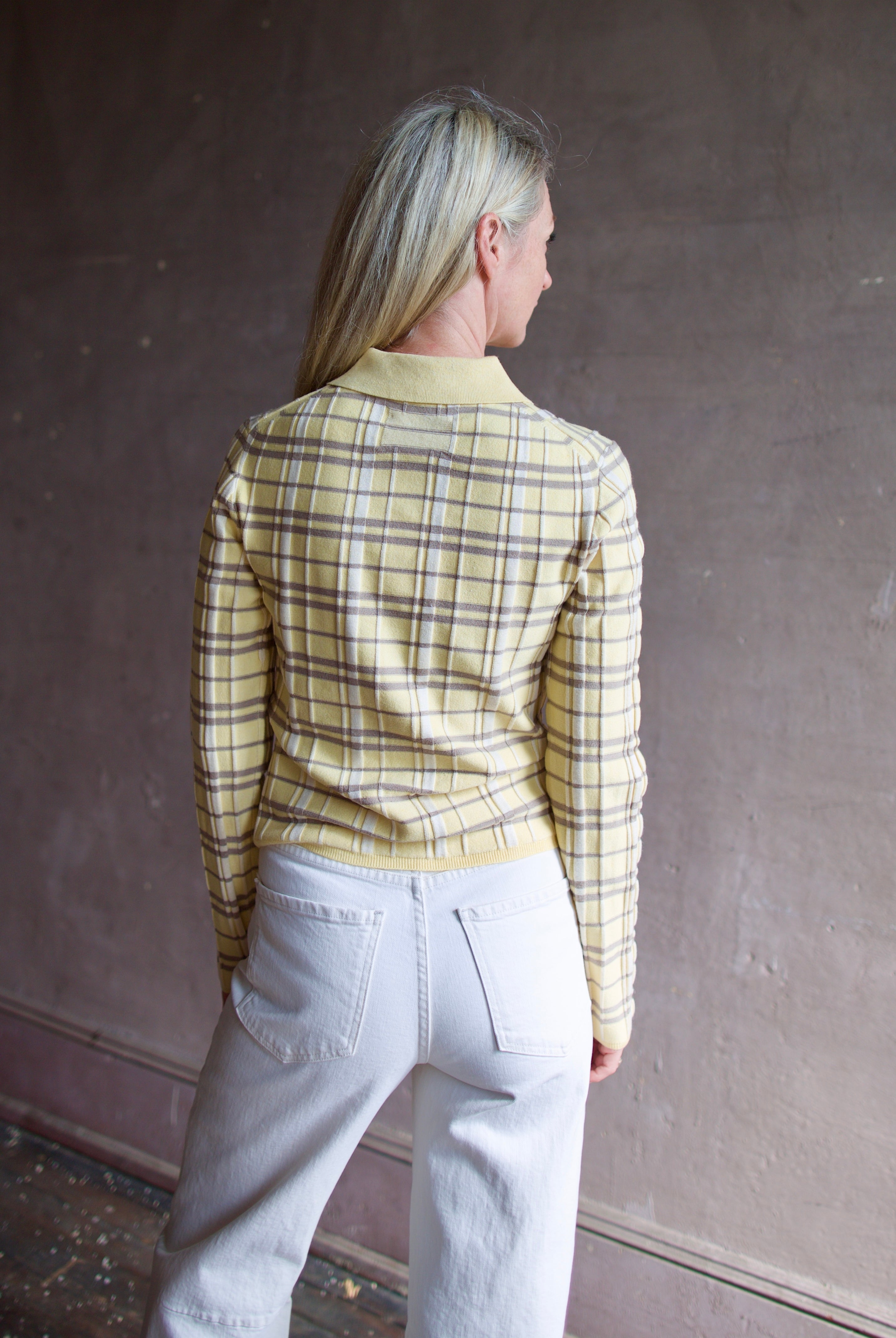 Model wearing premium designer Guest in Residence Plaid Elle Shirt in butter colorway, premium silk/linen fabric and versatile layering option
