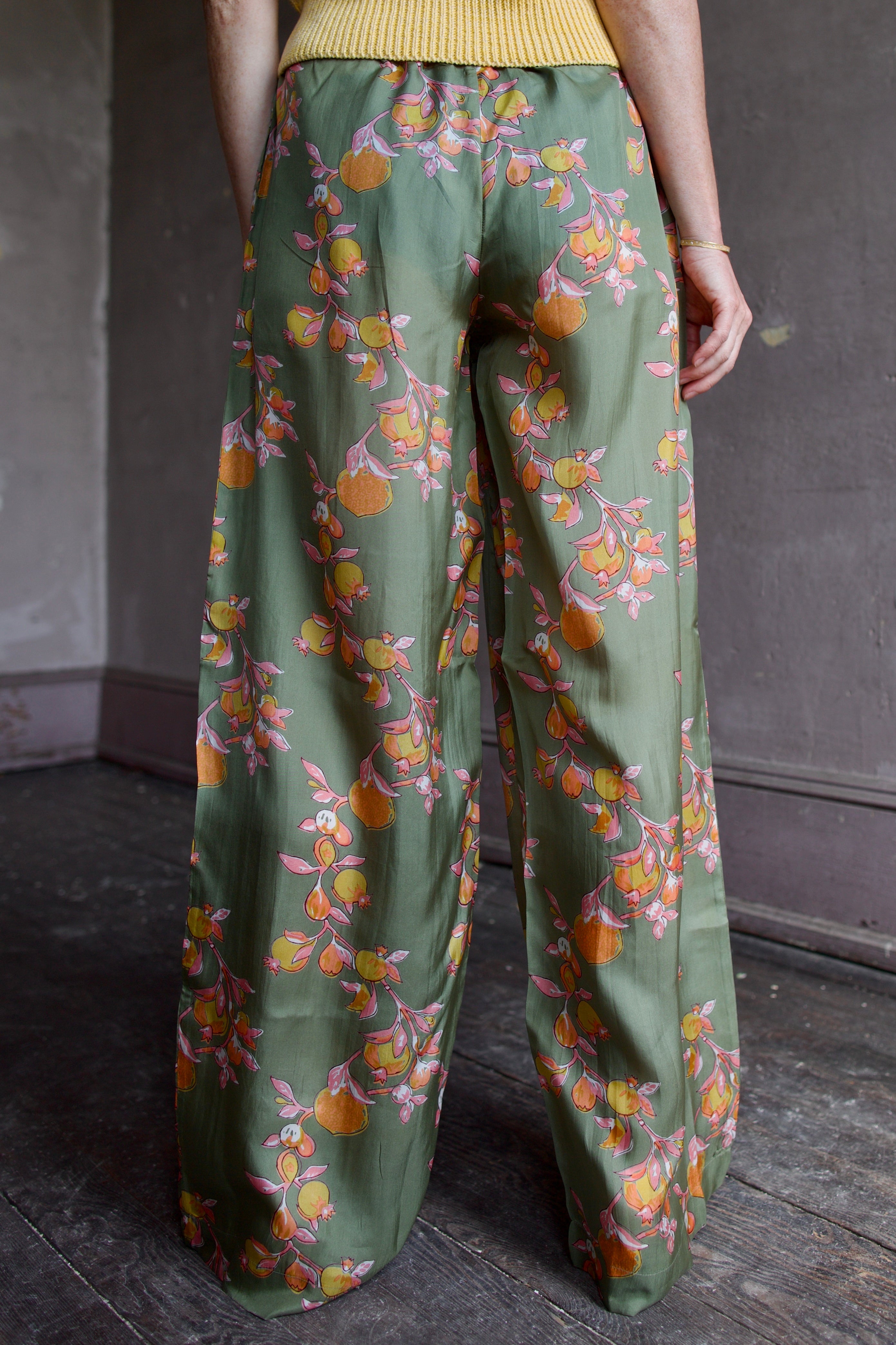 Back image of a woman wearing the Hannah Artwear Azra Pants