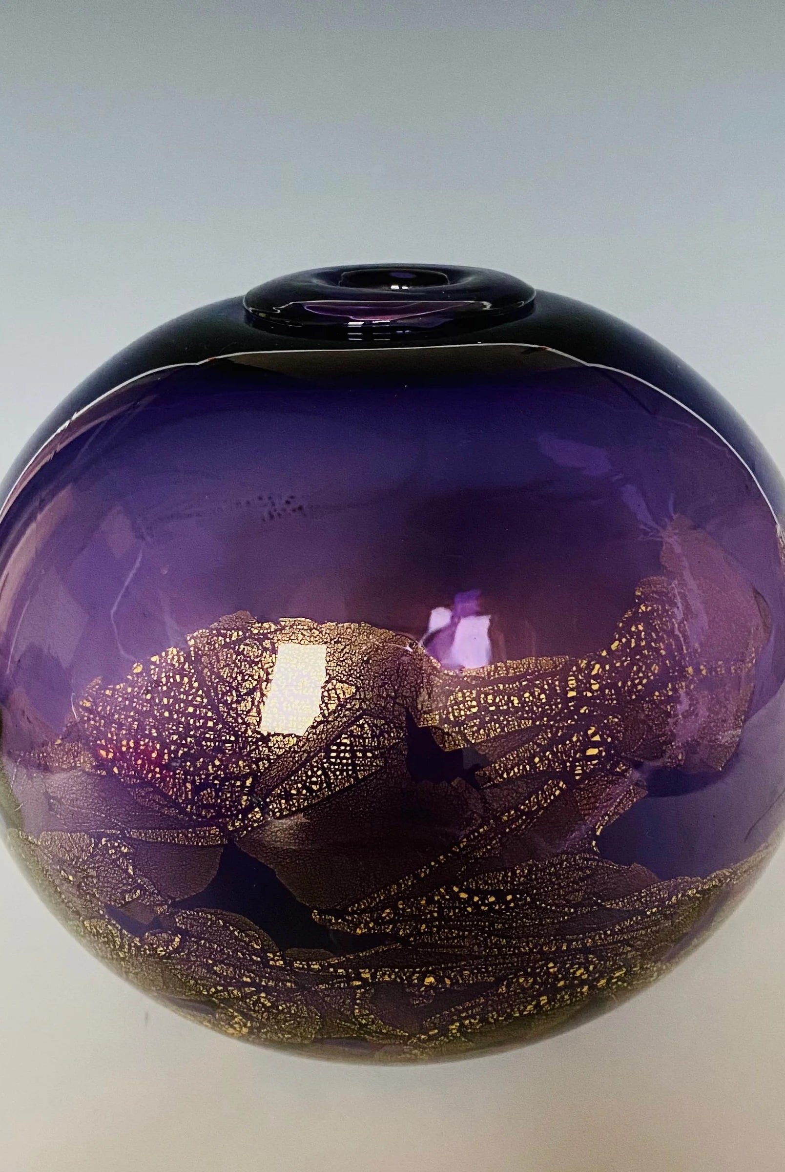 Small purple Glass sculptural Orb from John Shoemaker, a hand blown classic spherical vessel with gold leaf made in USA