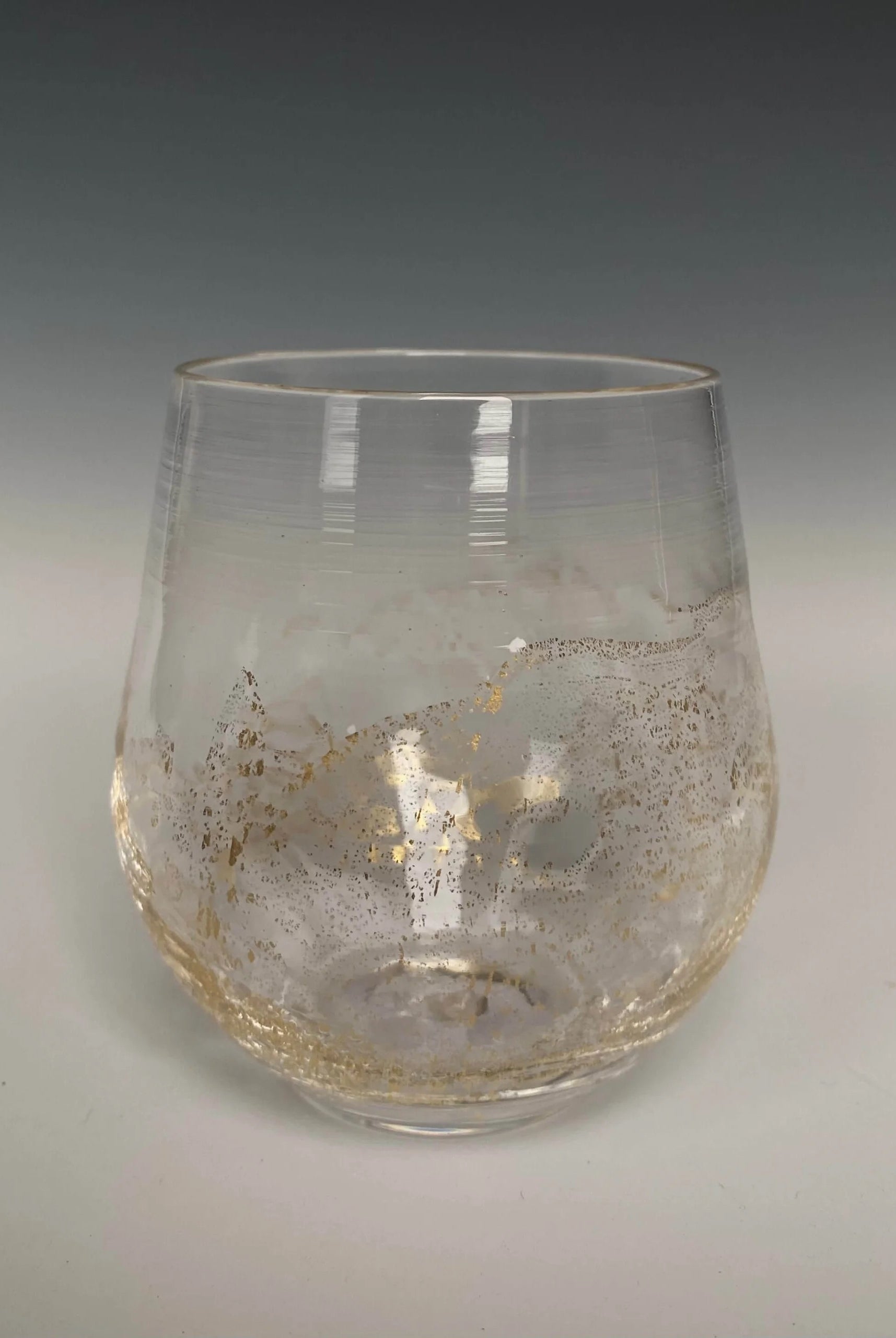 Handblown Stemless clear Wine Glass from North Carolina aritist John Shoemaker with gold leaf and made in USA