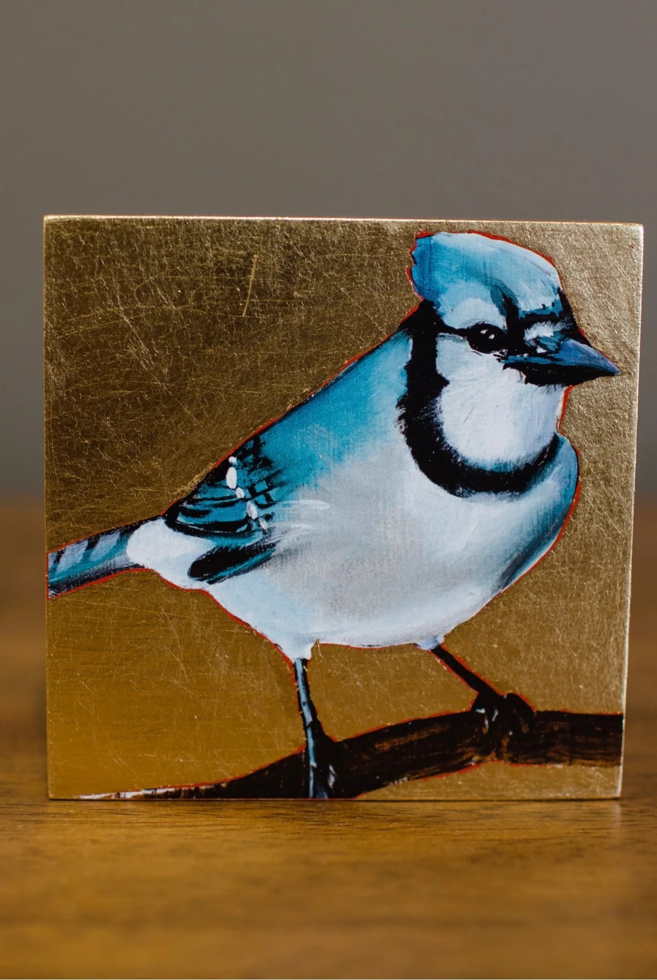 Image featuring a giclee by South Carolina artist Joseph Bradley with a Blue Jay and gold leaf.
