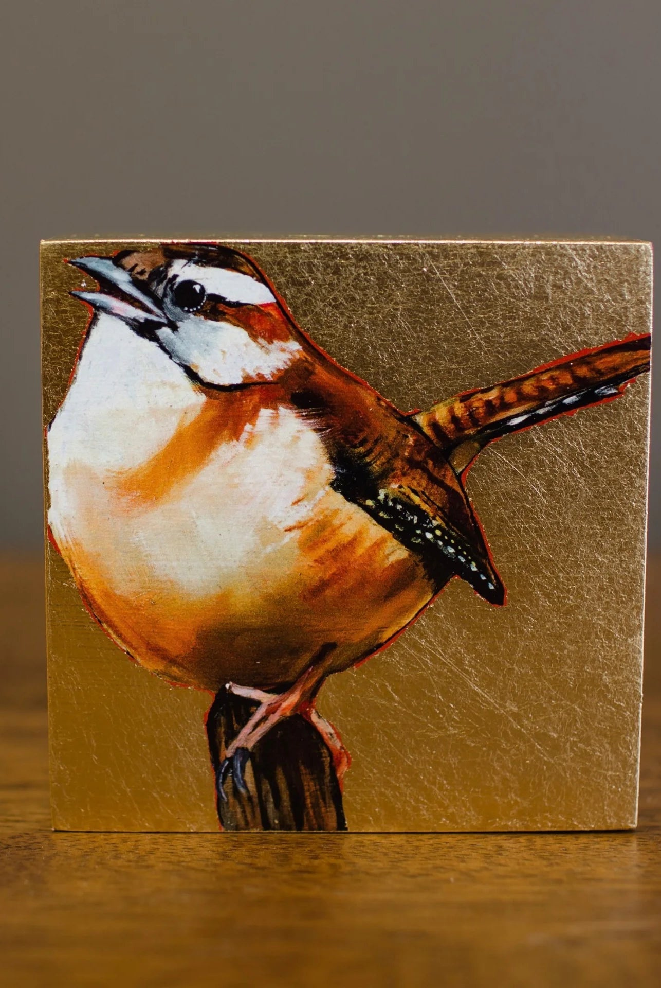 Image featuring a giclee by South Carolina artist Joseph Bradley with a Carolina Wren and gold leaf