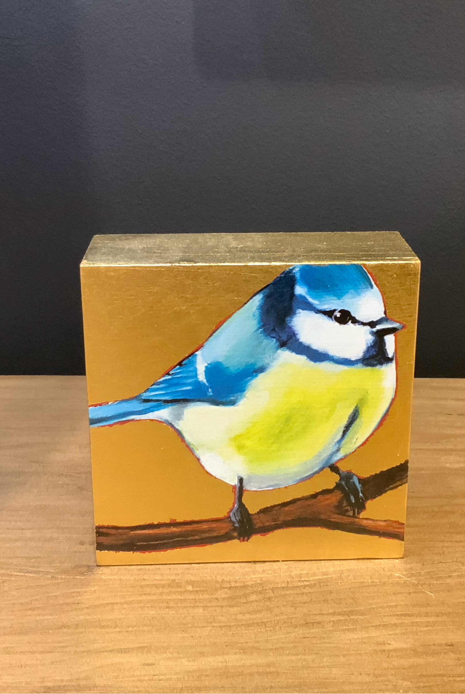 Image featuring South Carolina artist Joseph Bradley giclee with Eurasian Blue Tit bird and gold leaf.