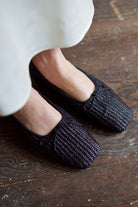 Mansur Gavriel Italian woven raffia ballerina flats designed with a square toe box and inoperable thin bows shoe on front