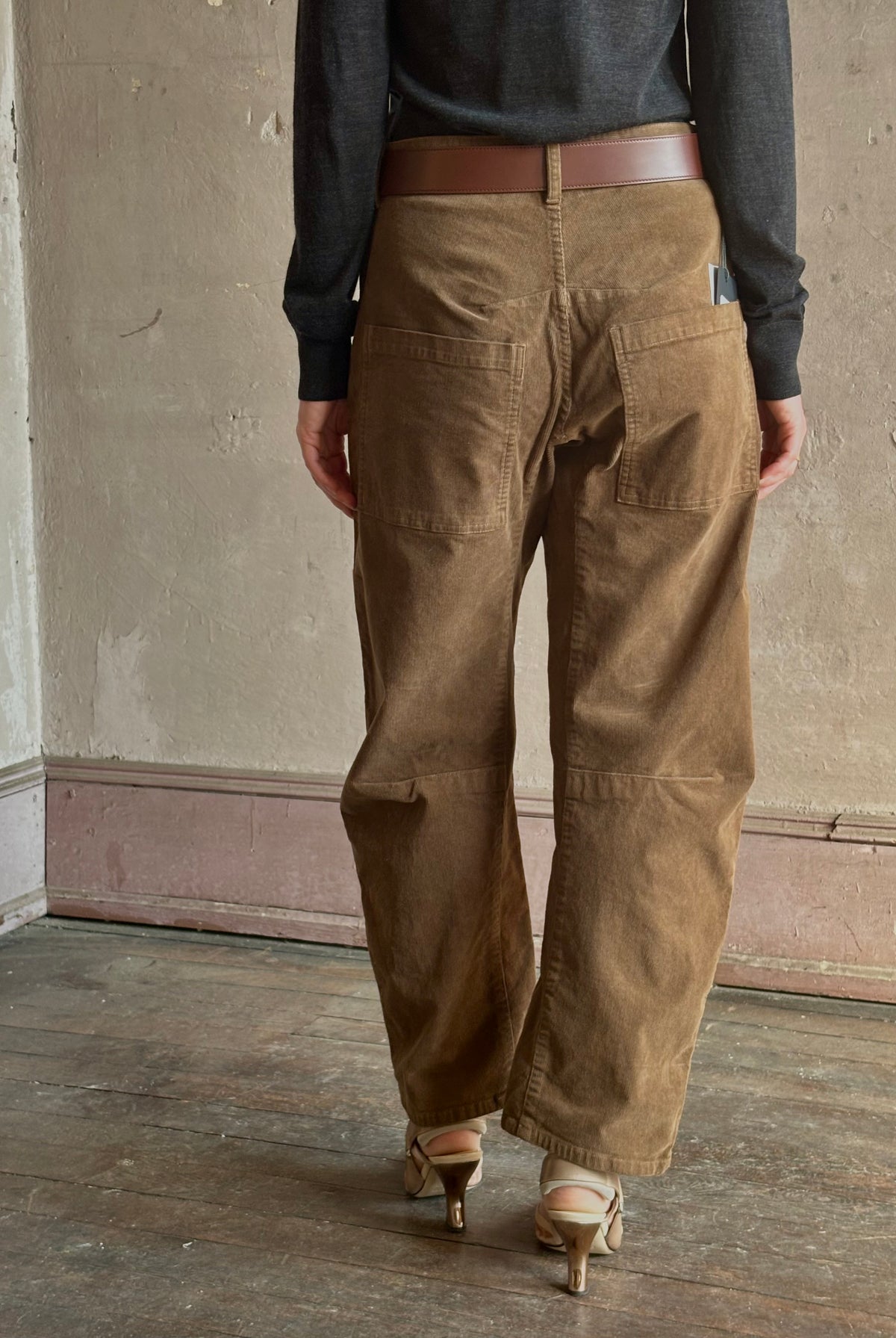Mature woman in Nili Lotan's Shon hazel Pant fine corduroy barrel silhouette oversized pockets workwear-inspired