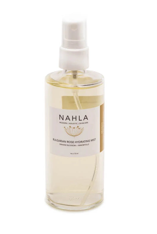 Image of Nahla Bulgarian Rose Hydrating Mist. This toner is made in the USA and dispensed in a glass bottle.