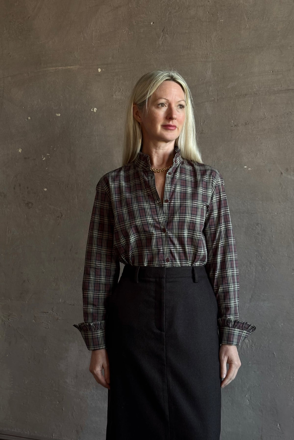 Nili Lotan’s Elio Cotton Plaid button down Shirt in Rustic Check with a mandarin collar and ruffle-trimmed cuffs long sleeves and lightweight