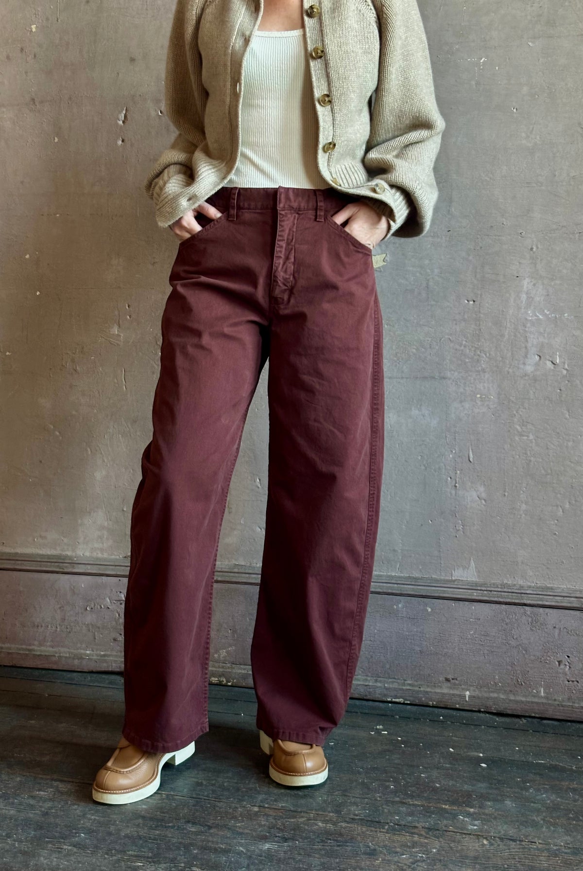 Nili Lotan’s Tribeca Pant in Cabernet a cotton-elastane barrel leg with a relaxed fit and bar-and-zip closure. Made in the USA