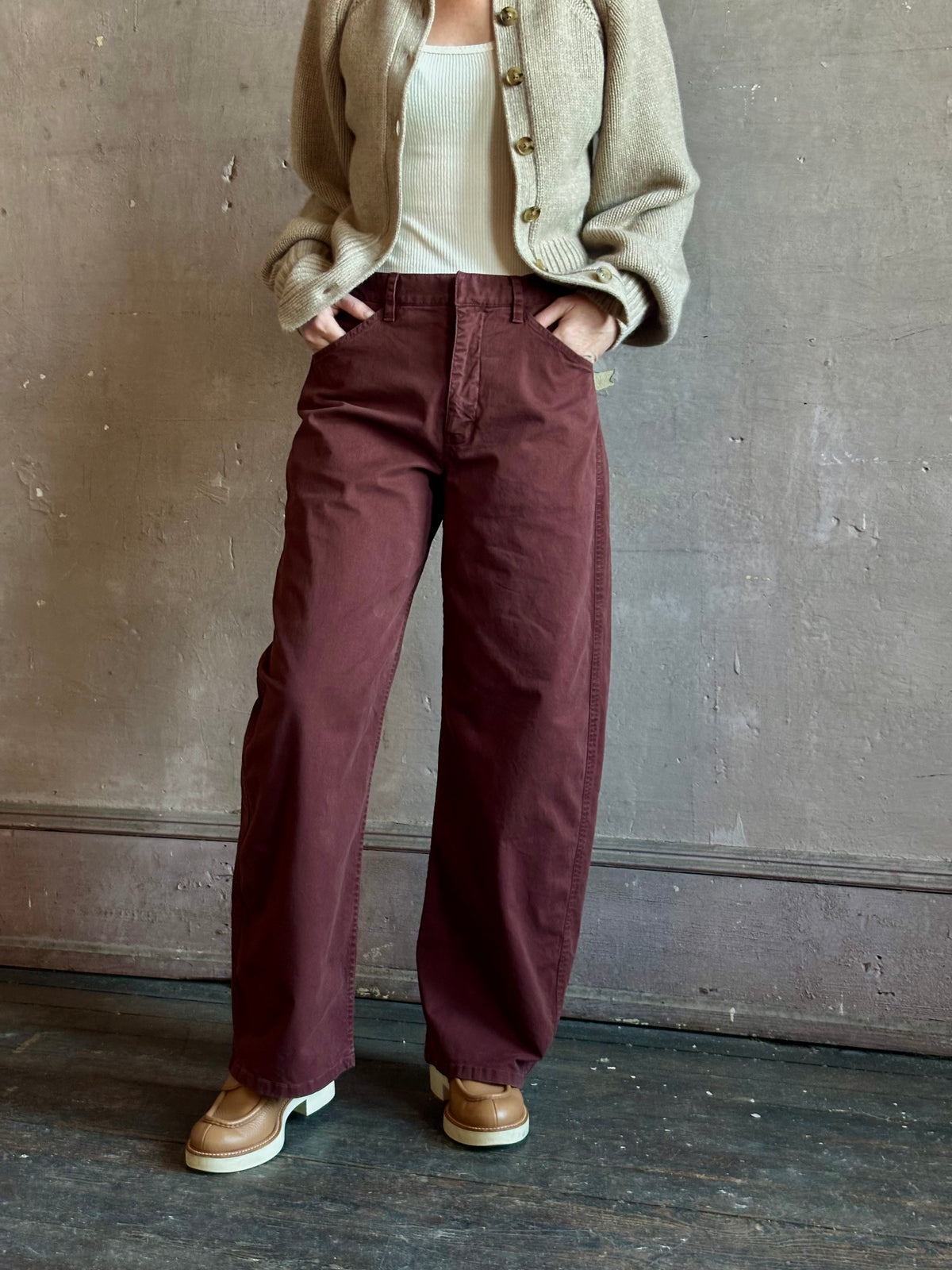 Nili Lotan’s Tribeca Pant in Cabernet a cotton-elastane barrel leg with a relaxed fit and bar-and-zip closure. Made in the USA
