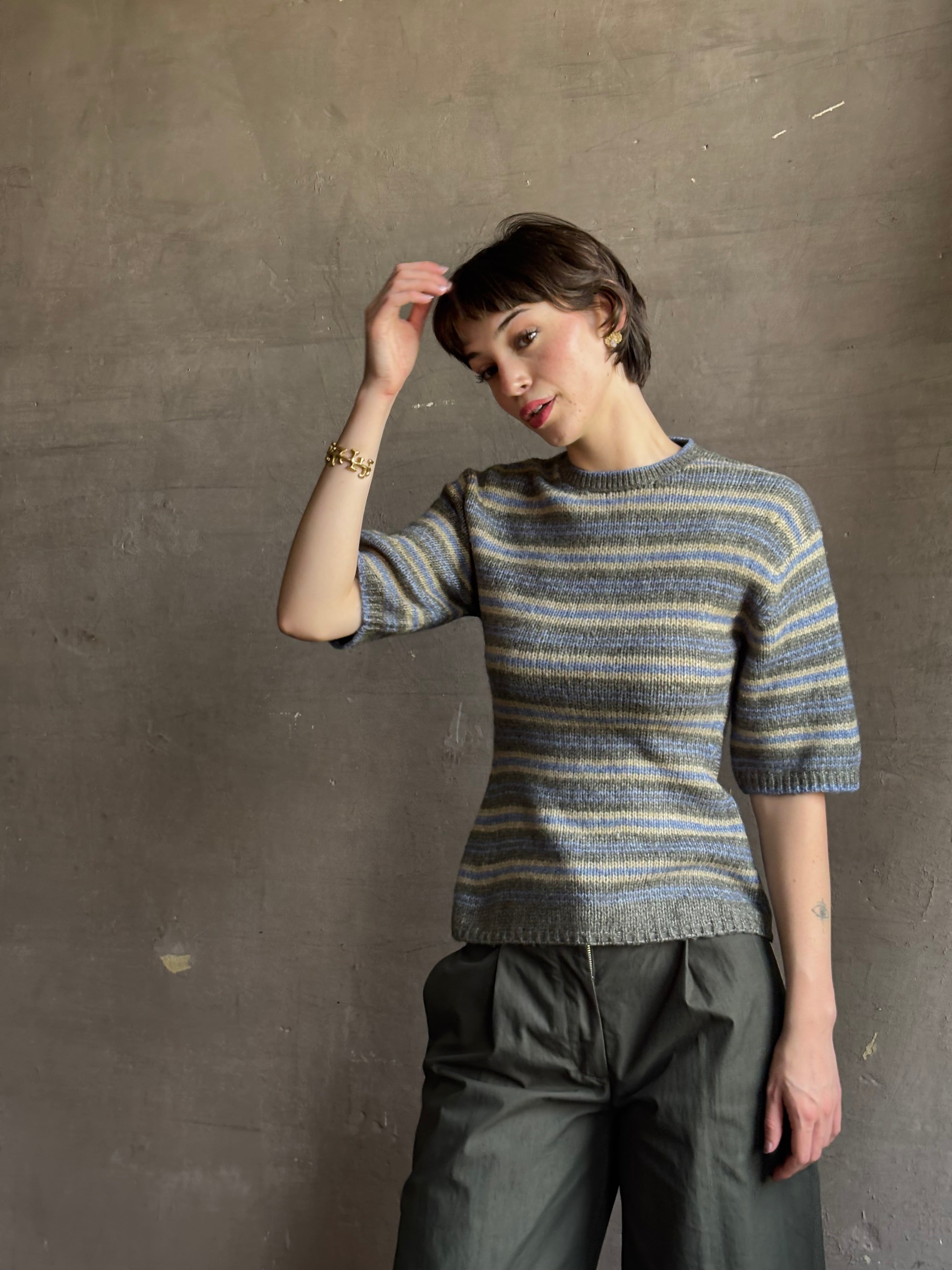 luxury brand Proenza Schoulder Dana sweater with short-sleeve knit top with blue, gray, and beige horizontal stripes