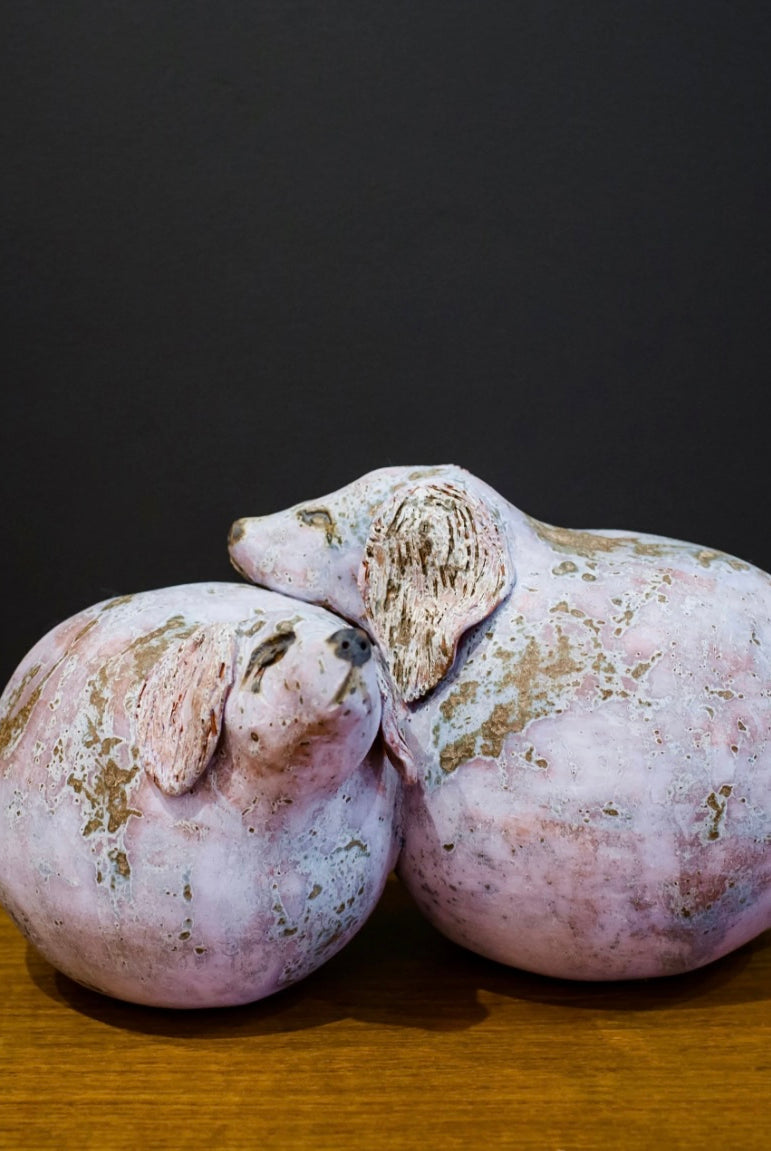 Image featuring North Carolina pottery artist Pam Brewer Hair of the Dog hand built dog sculpture